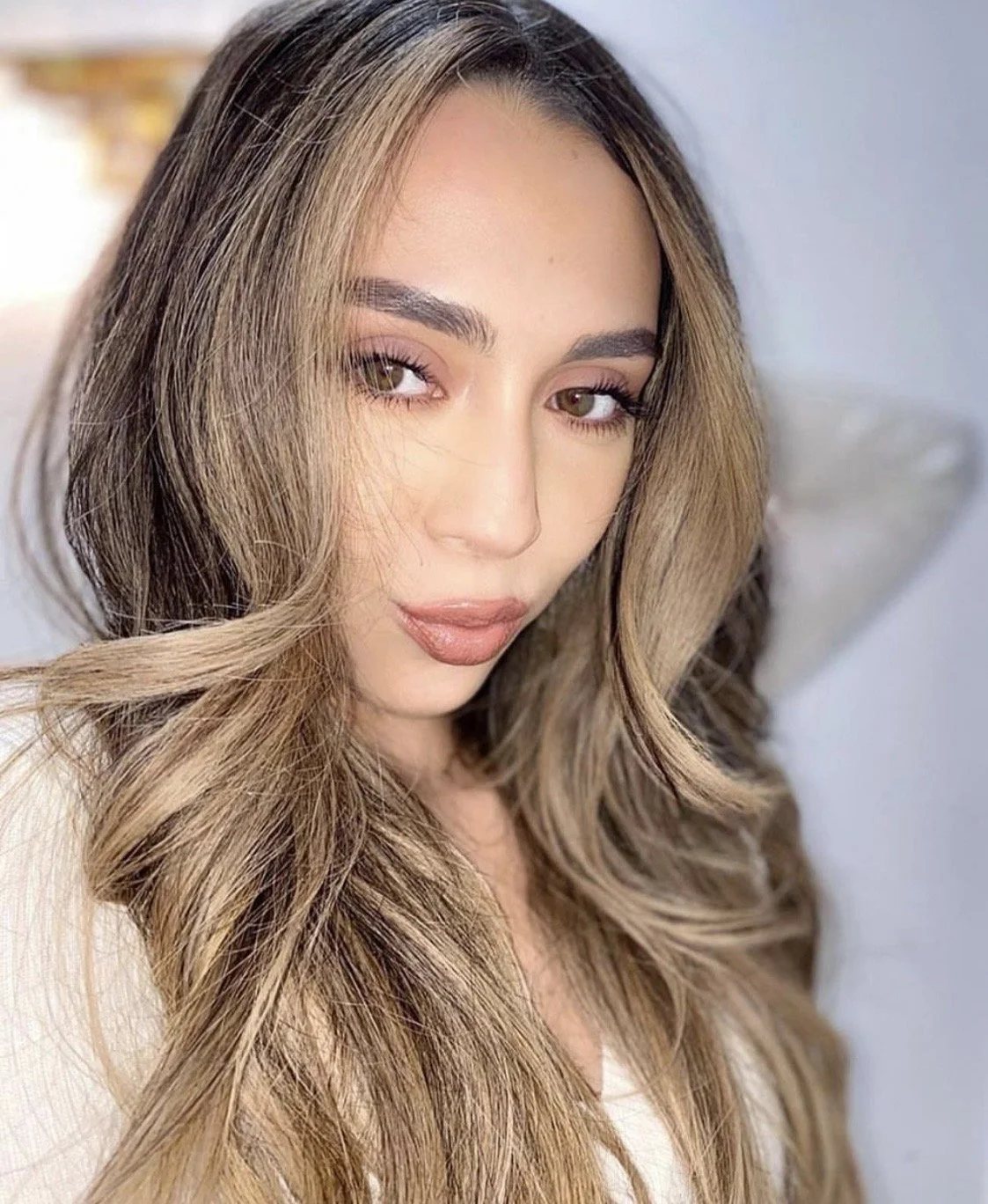 Dimensional, lived-in brunette balayage at Bellibone Salon in Bergen County, NJ.