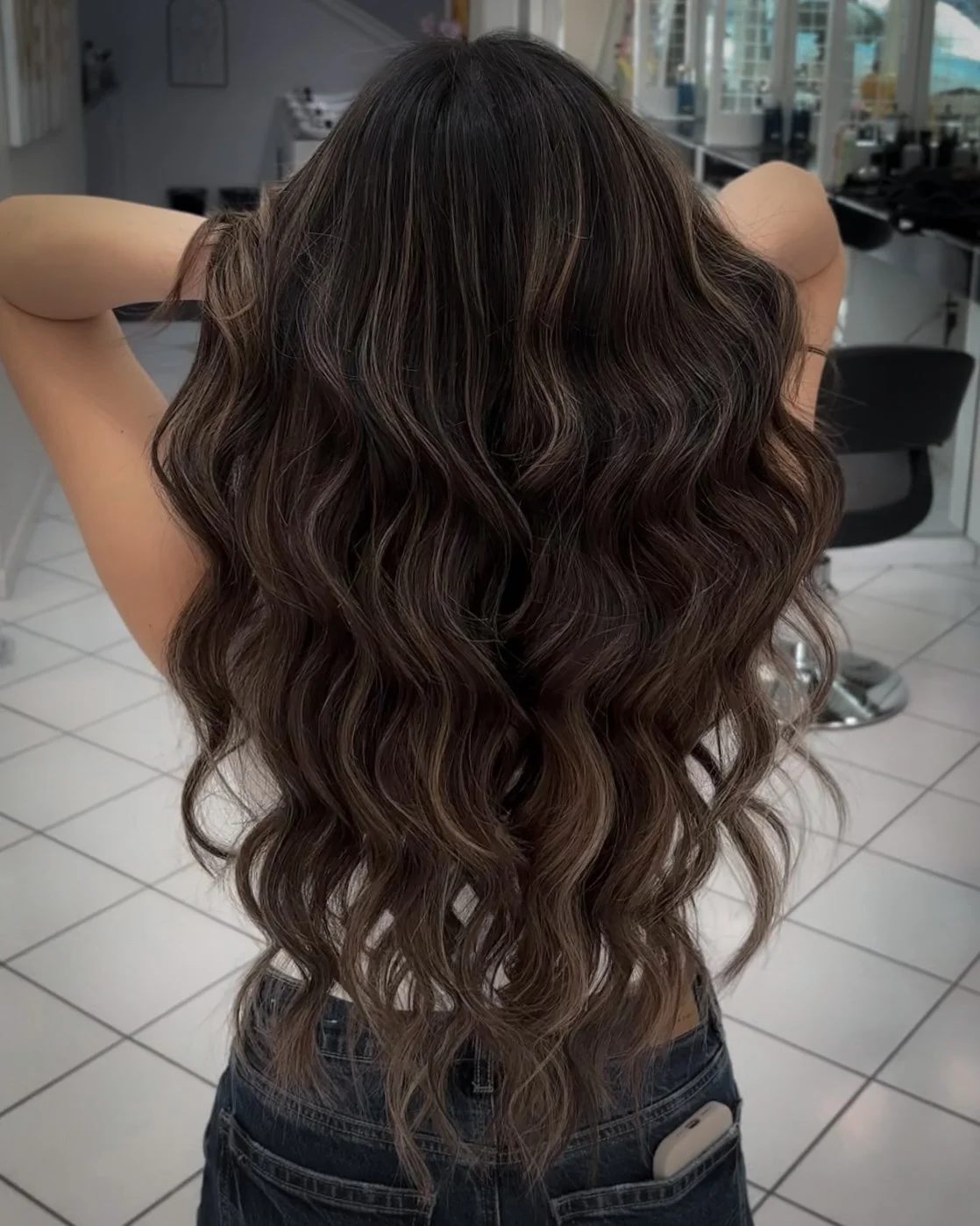 Hand-tied weft extension application and lived-in color in Bellibone Salon in Bergen County, NJ.