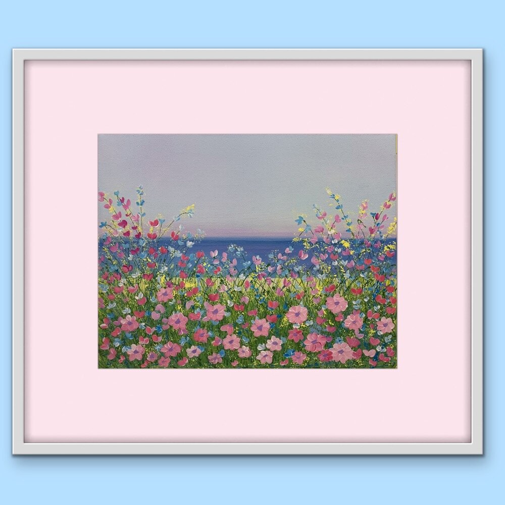 floral lakeside art with pink mat on blue wall.JPG