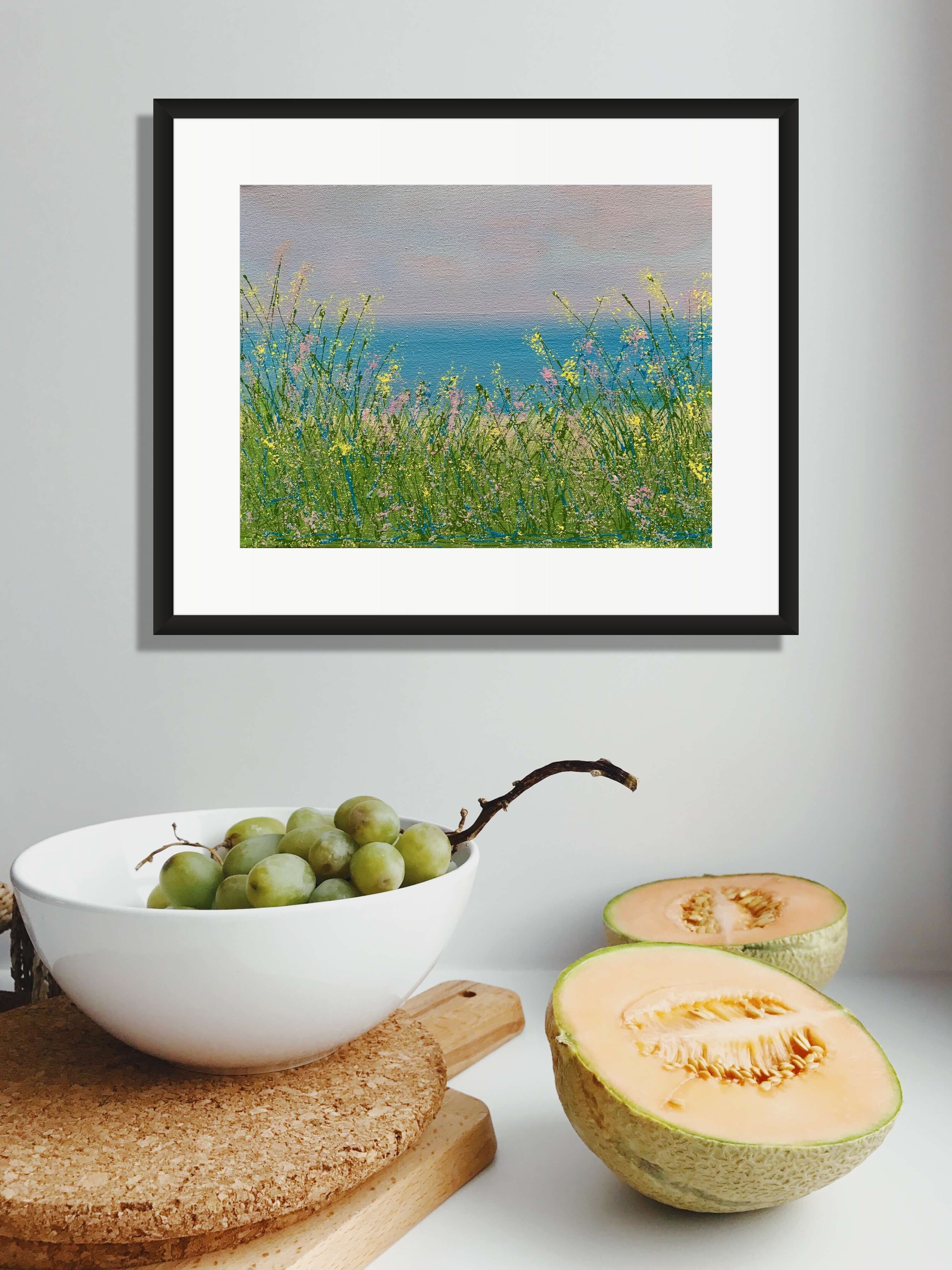 Great Lakes painting above fruit on table.jpg