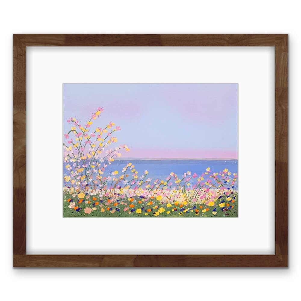 floral lakeside painting with white mat and dark brown wood frame on white wall