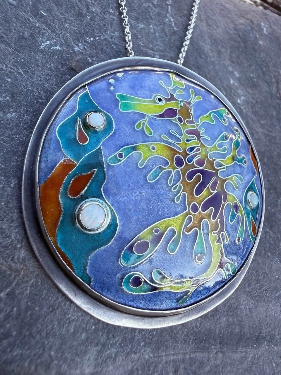 wild thing leafy sea dragon fire enamel silver medallion pendant brooch with 3 opals by Natalia Shoutova handmade jewellery at lightwave jewellery studio in the new forest jewellery courses