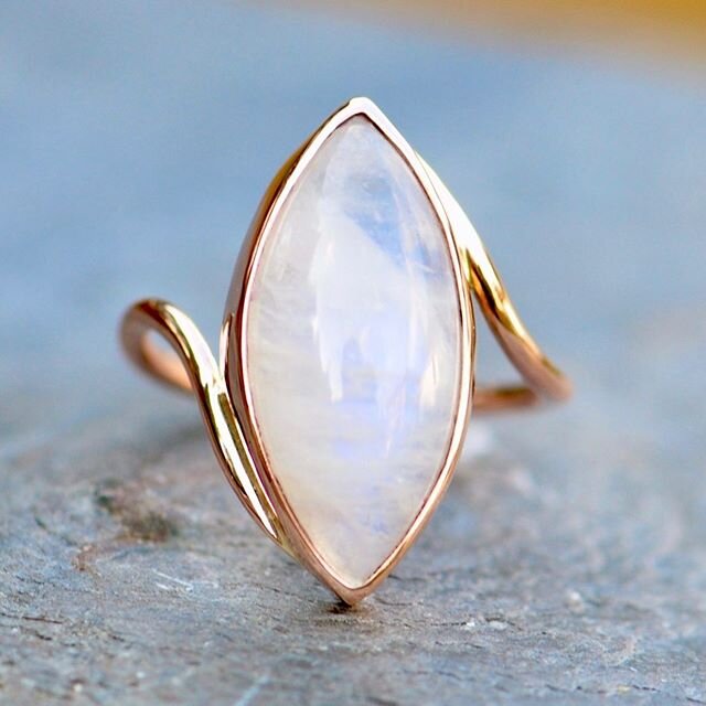 Moonstone with a stunning blue flash set in rose gold. Bespoke commission for @jillmariemp. When we first spoke about the design, I mentioned that most moonstones have a stronger blue flash when set in an enclosed, even oxidised setting. Not this one