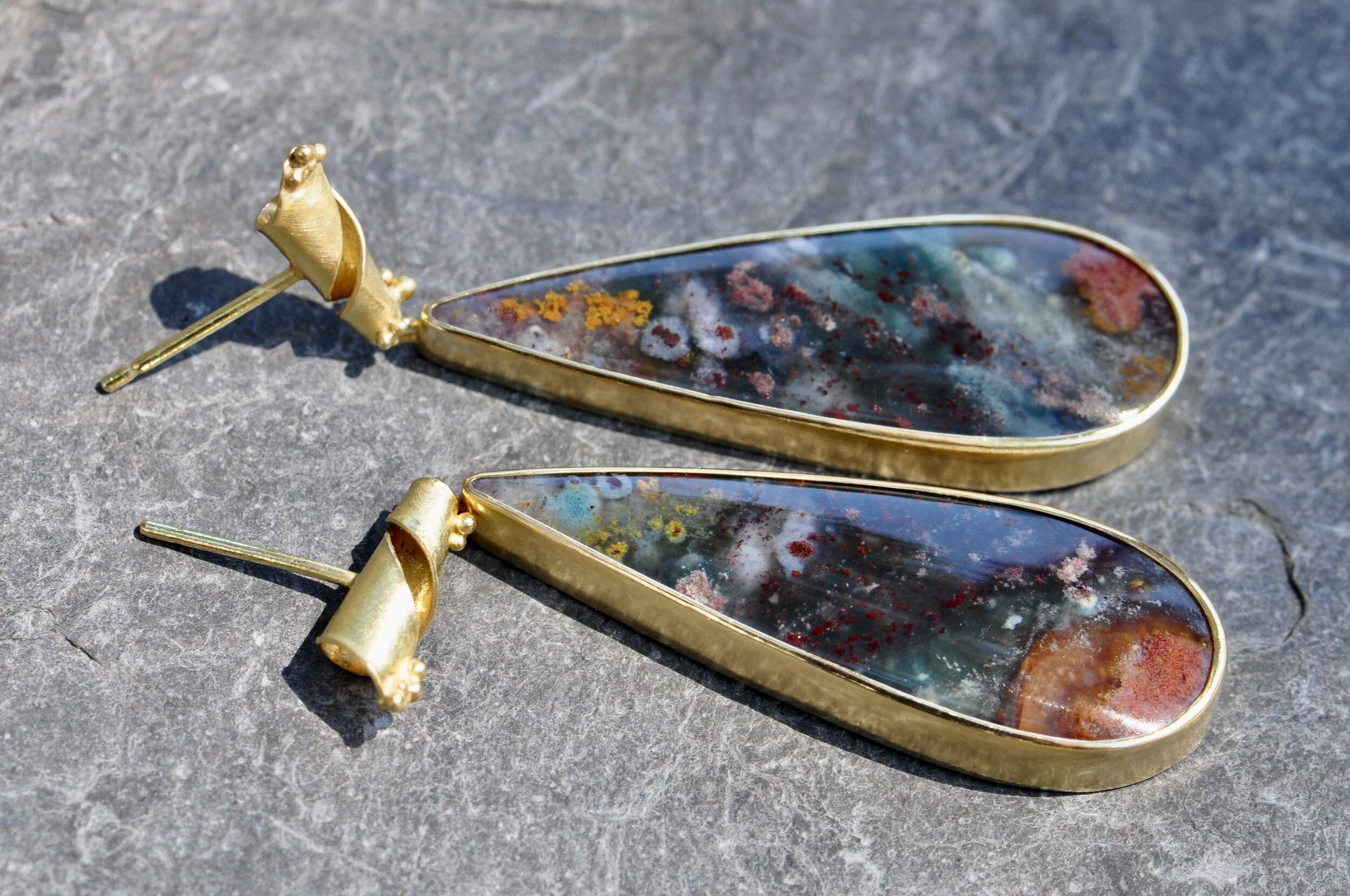 Galaxies in 18ct gold