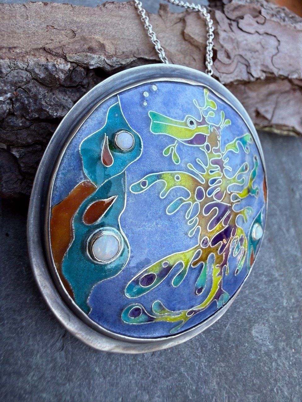 wild thing leafy sea dragon fire enamel silver medallion pendant brooch with 3 opals by Natalia Shoutova handmade jewellery at lightwave jewellery studio in the new forest jewellery courses