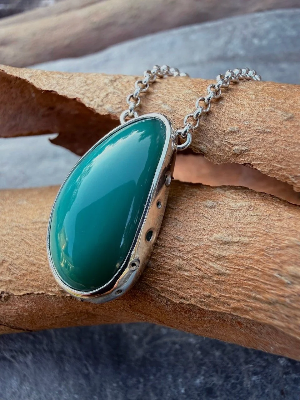 Teal turquoise blue opalised wood silver pendant natalia shoutova lightwave jewellery new forest jewellery courses