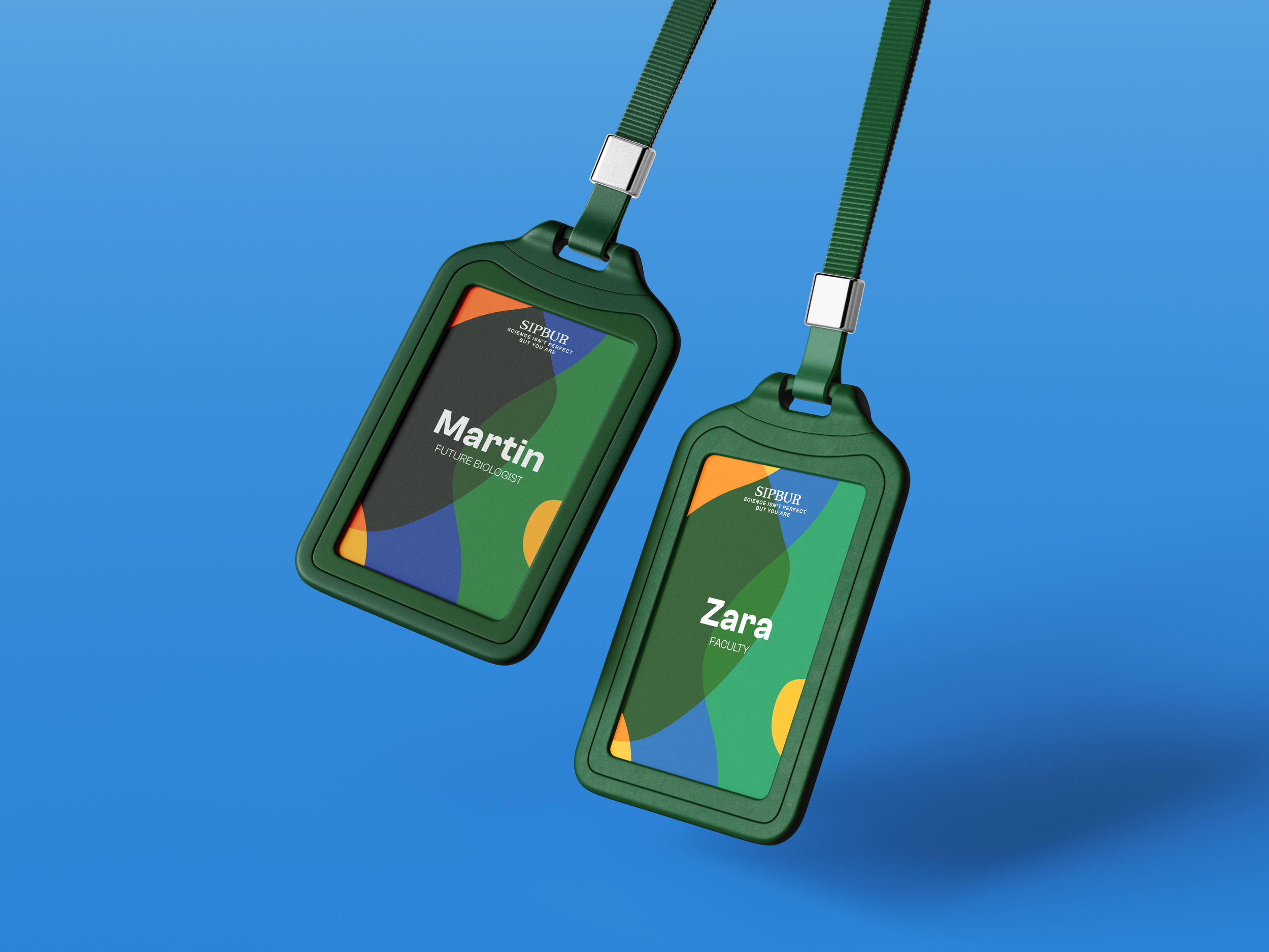 A pair of IDs mocked up against a plain background.