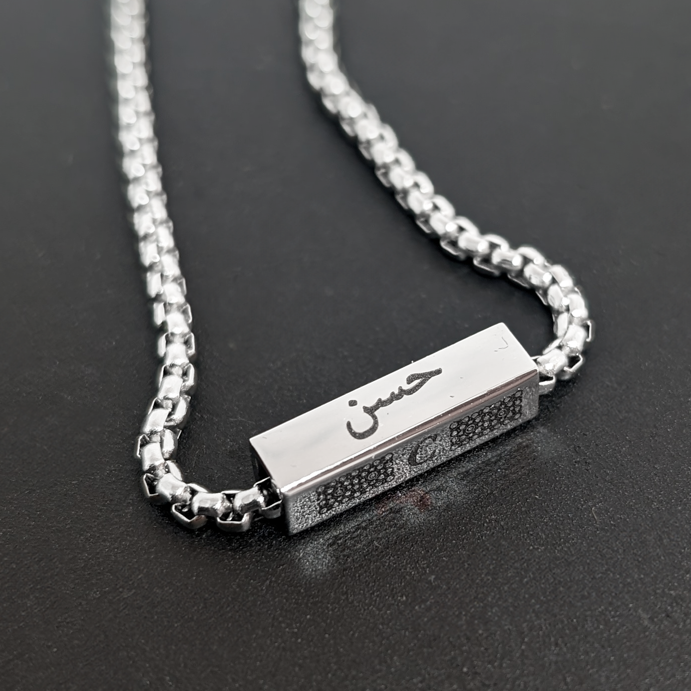 Side 1 name arabic square.png