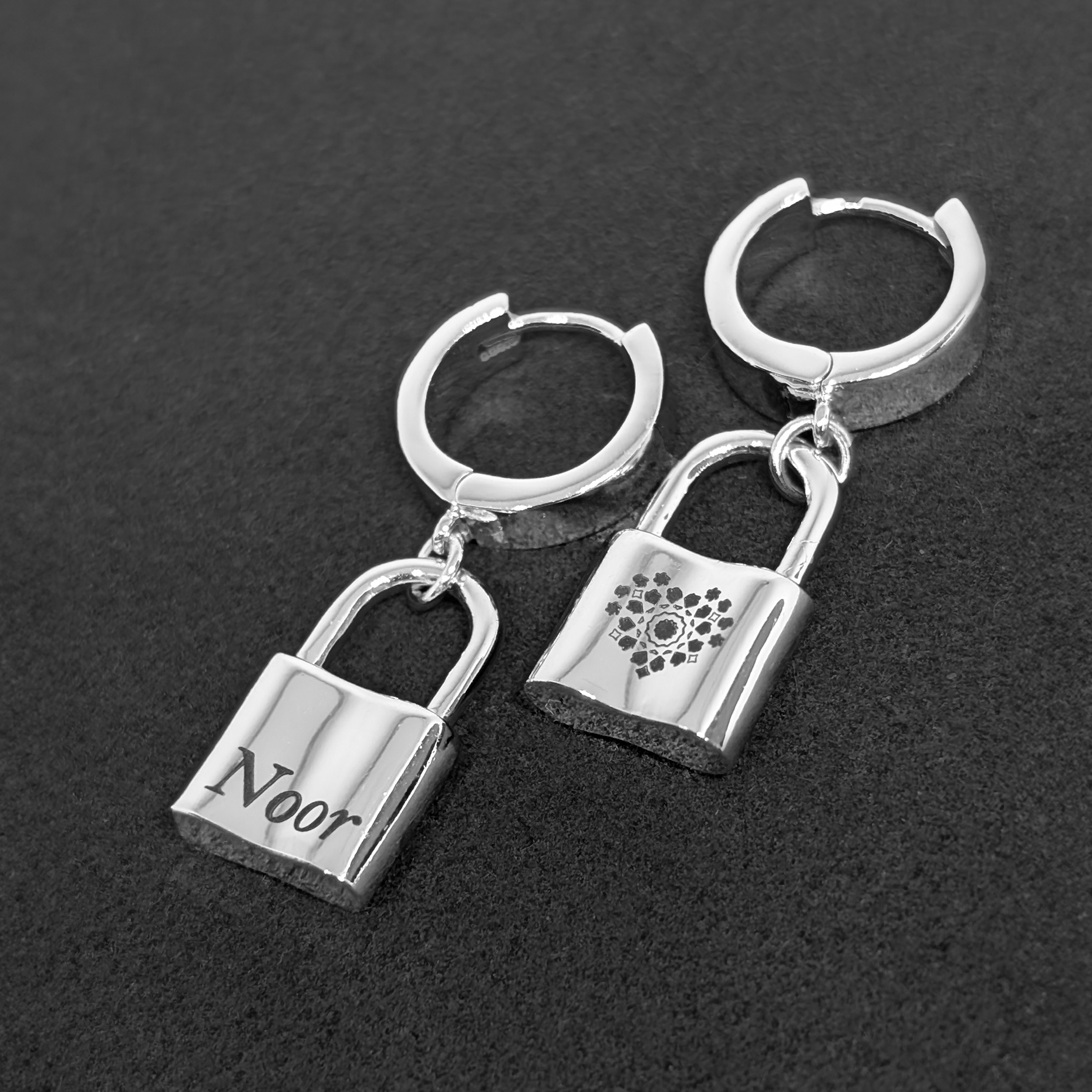 lock earrings square - noor english silver.png