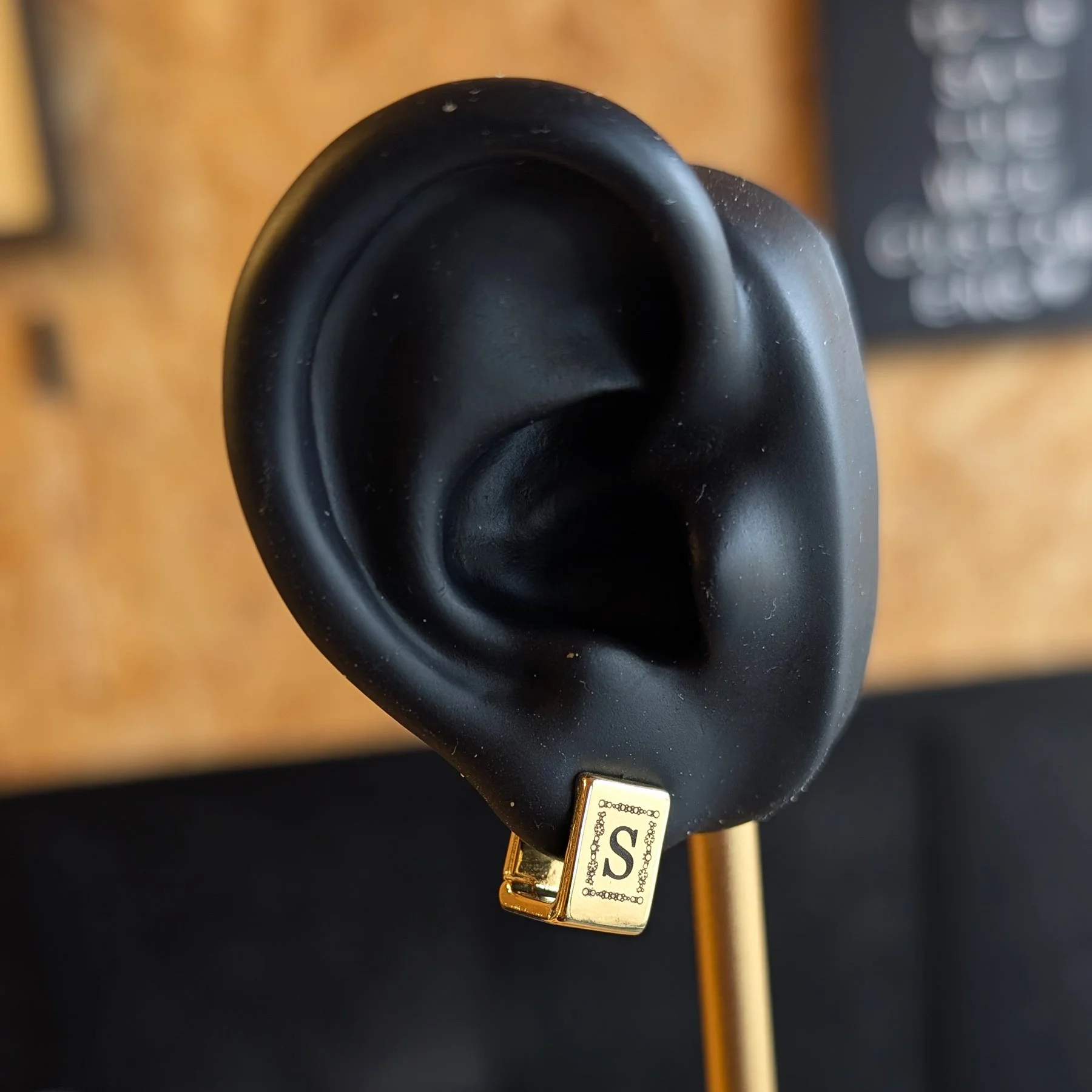 square hoop earring ear shot.jpg