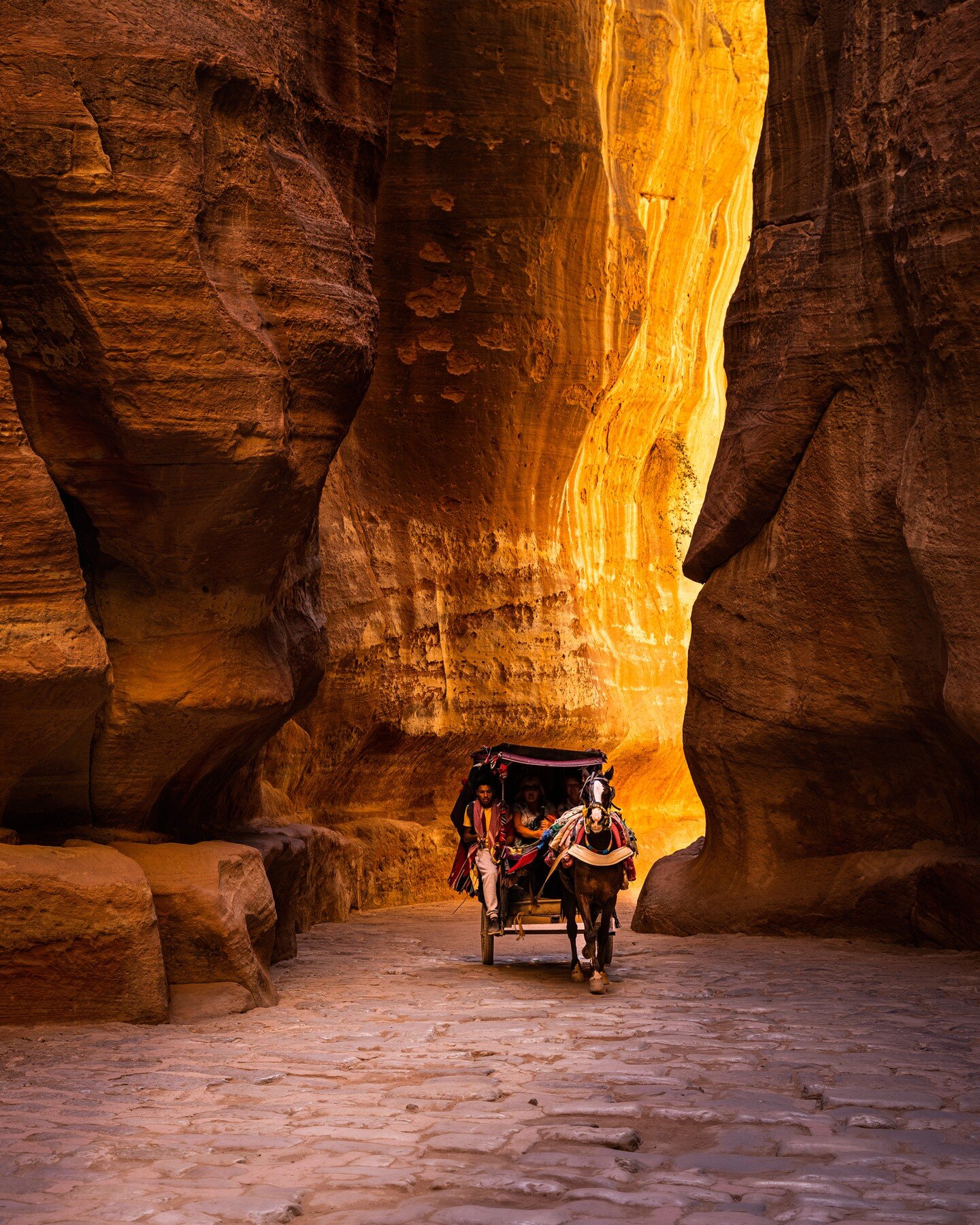 Those moments when you travel that leave you giddy. The walk from town into Petra is amazing - the ancient slot canyon is gorgeous and we had fantastic afternoon light bouncing around, every turn offered something new. About 1/2 way in we spent some 