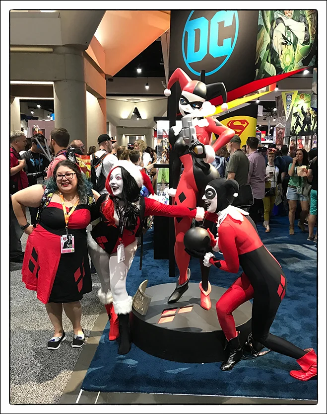 Harley Quinn cosplayers each with their own take on the famous character.