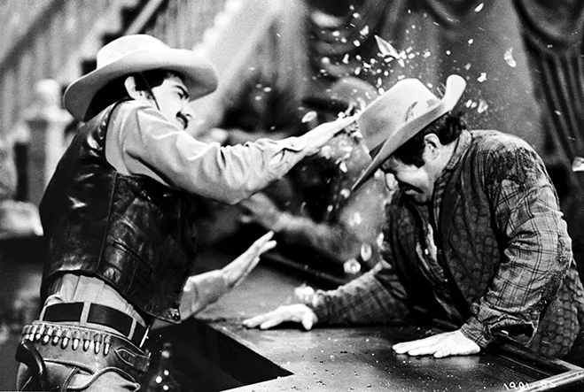 Richard Benjamin (left) in a barroom brawl with a Westworld robot.
