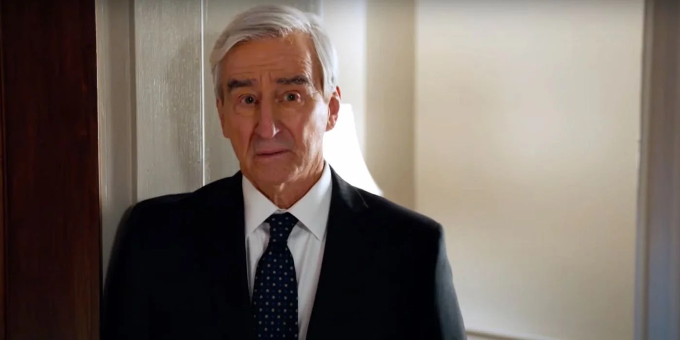 Sam Waterston as Jack McCoy wearing a dark suit and tie
