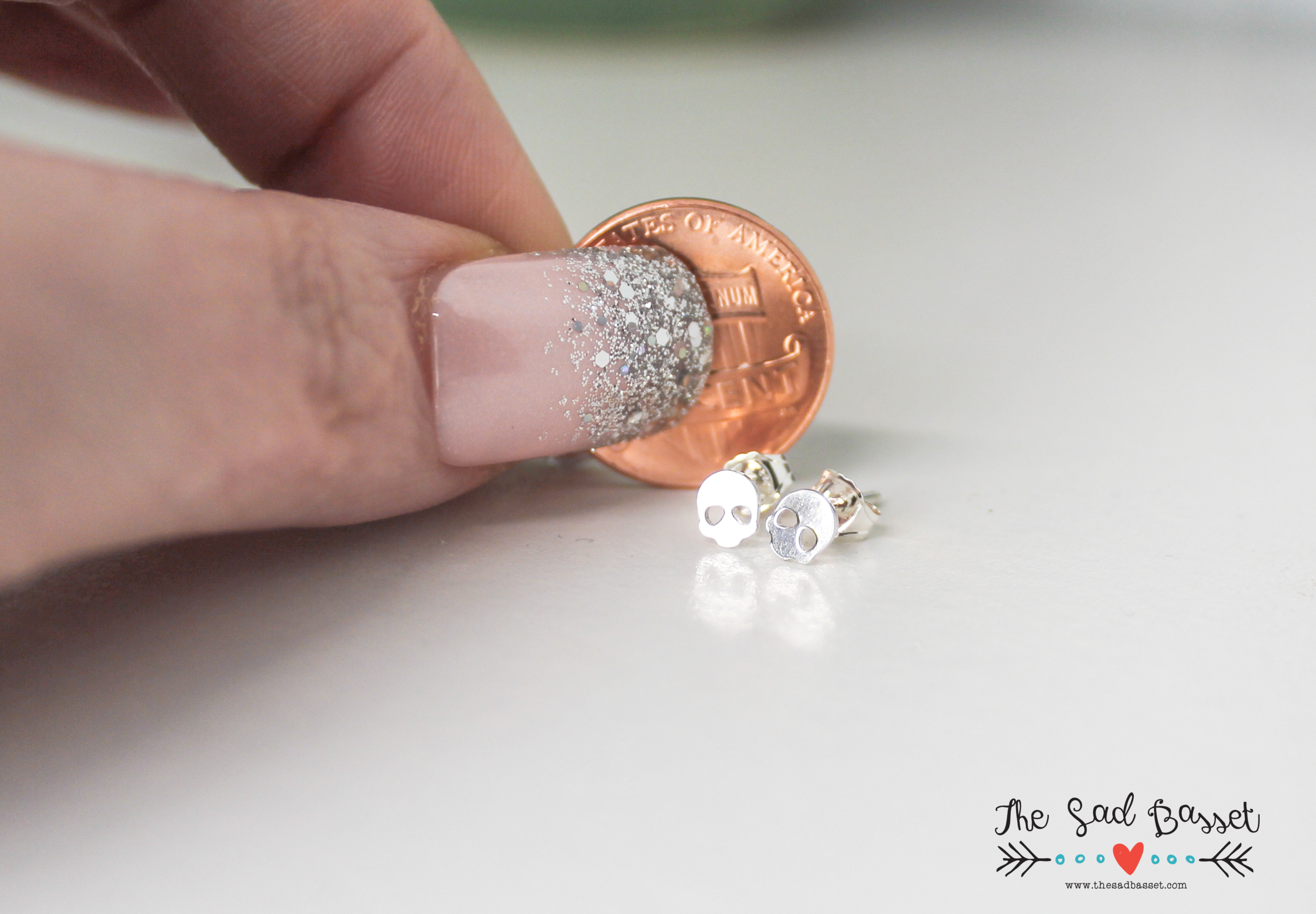 handmade sterling silver skull post earrings