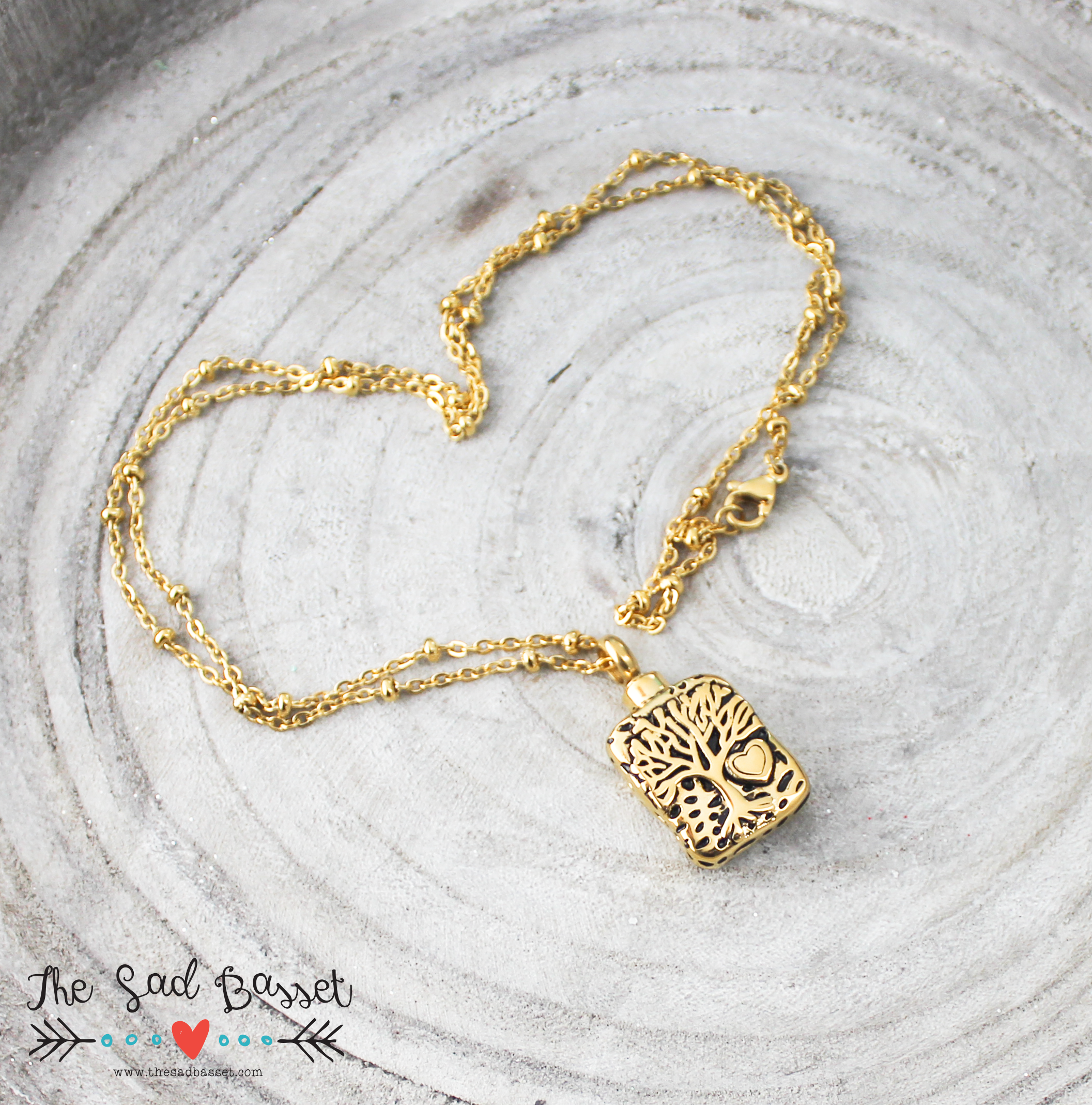 gold ash urn pendant