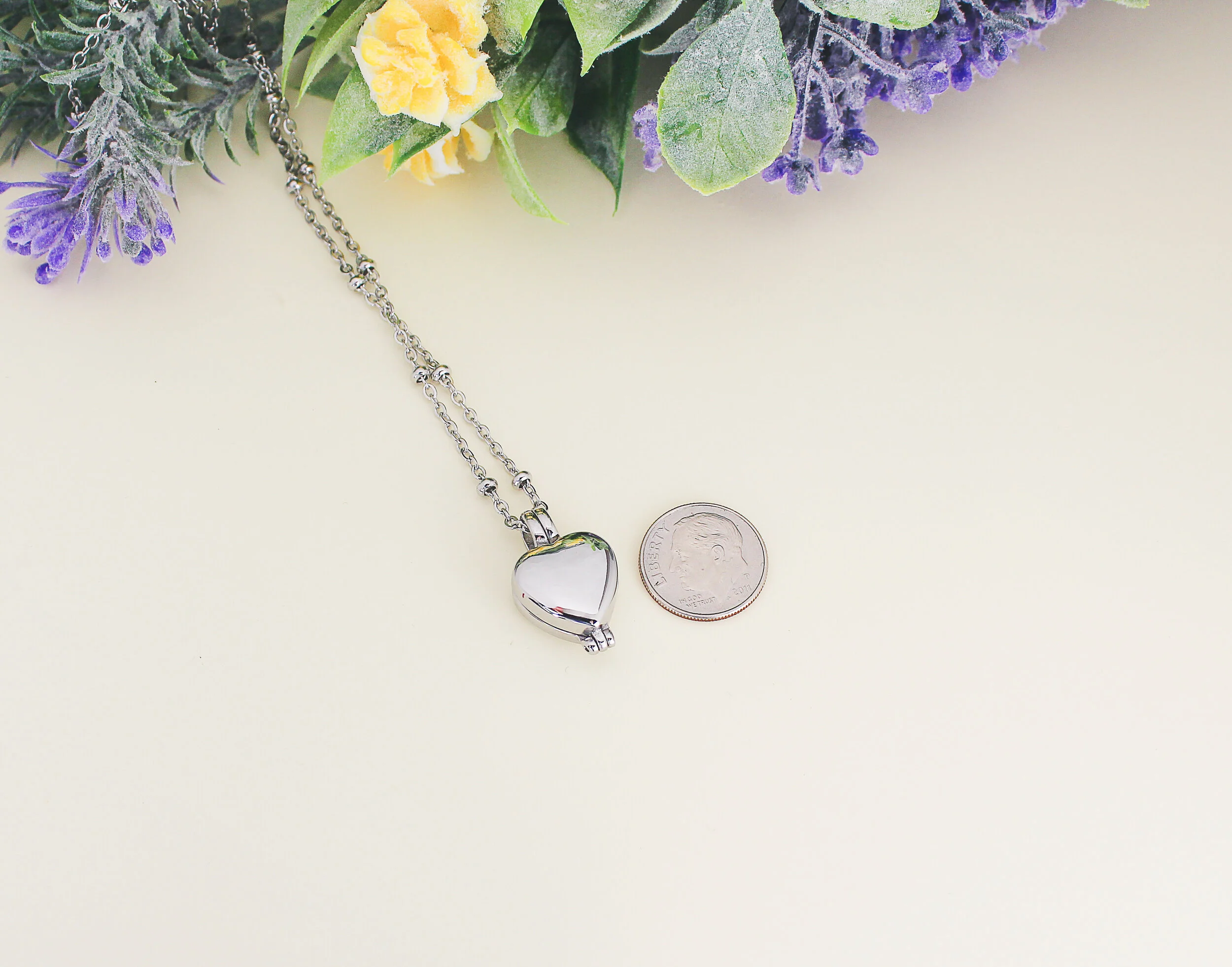 IMG_9613_clamshell_heart_cremation_urn_vial_necklace.jpg
