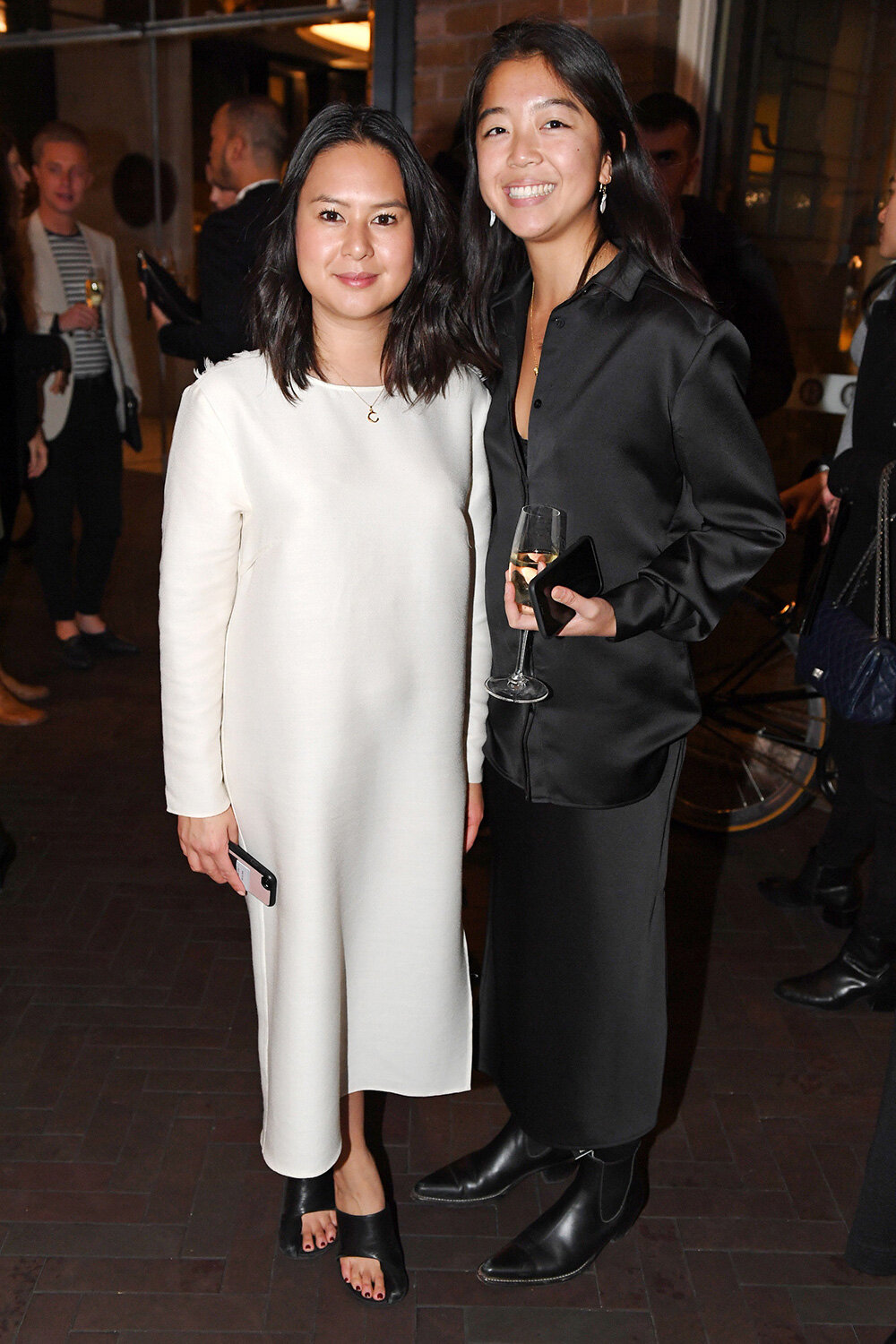 Harper’s Bazaar Junior Fashion Editor Caroline Tran with Harper’s Bazaar’s Sam Wong