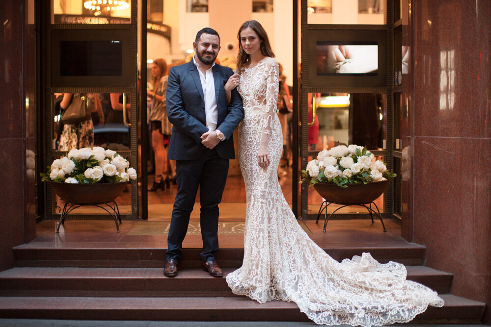 Steven Khalil outside Fairfax &amp; Roberts boutique with model wearing exquisite couture gown.