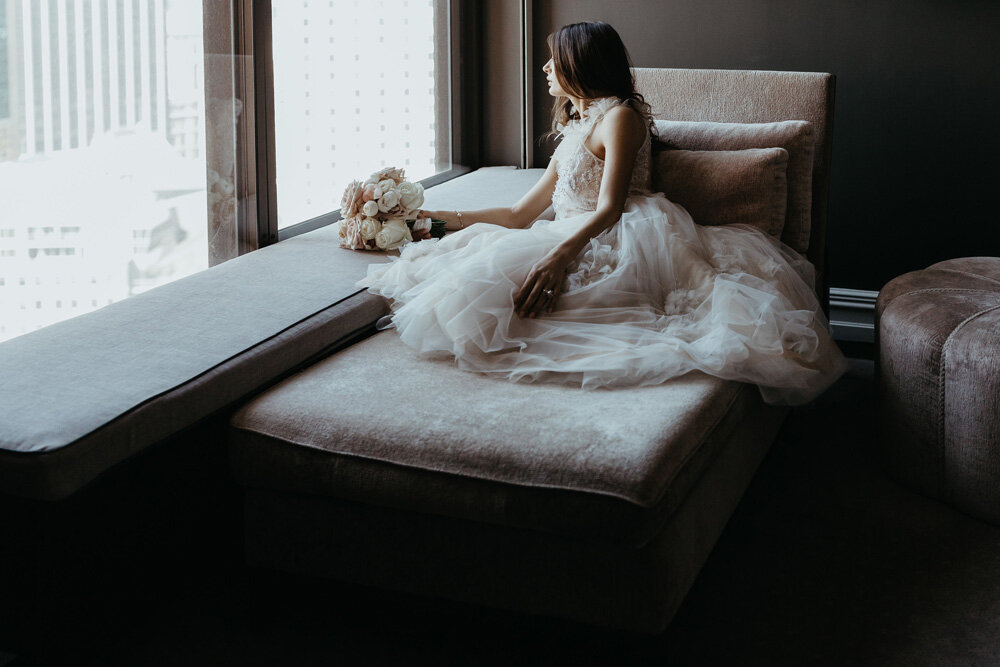 Leah sitting pretty in the Presidential Suite with stunning bouquet from Grandiflora