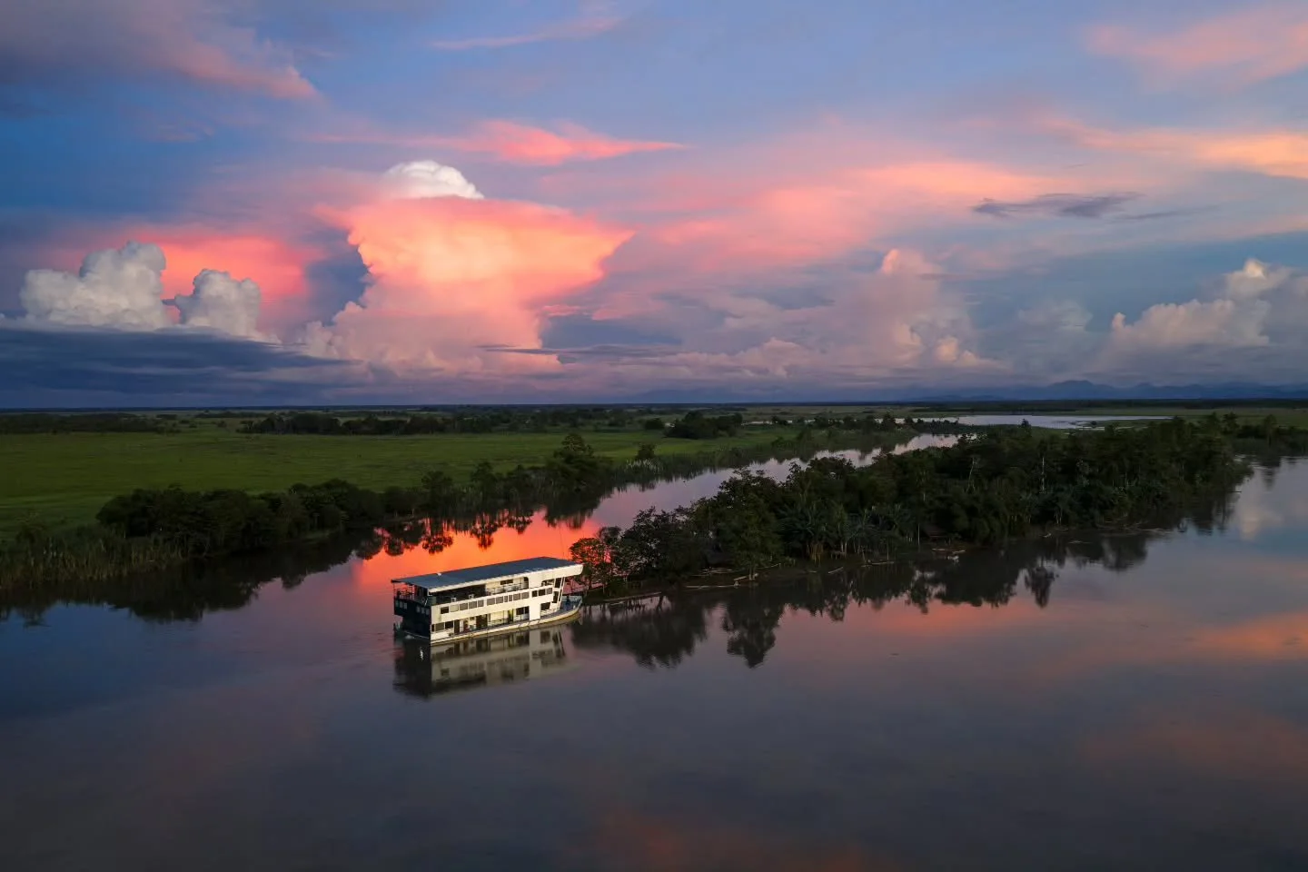 Dreamy days and nights on our private houseboat cruising the Karawari and Kosomeri Rivers and into the Black Water Lakes, Papua New Guinea.

It is stunning watching the scenes roll by - with dugout canoe constantly passing and the silence only broken