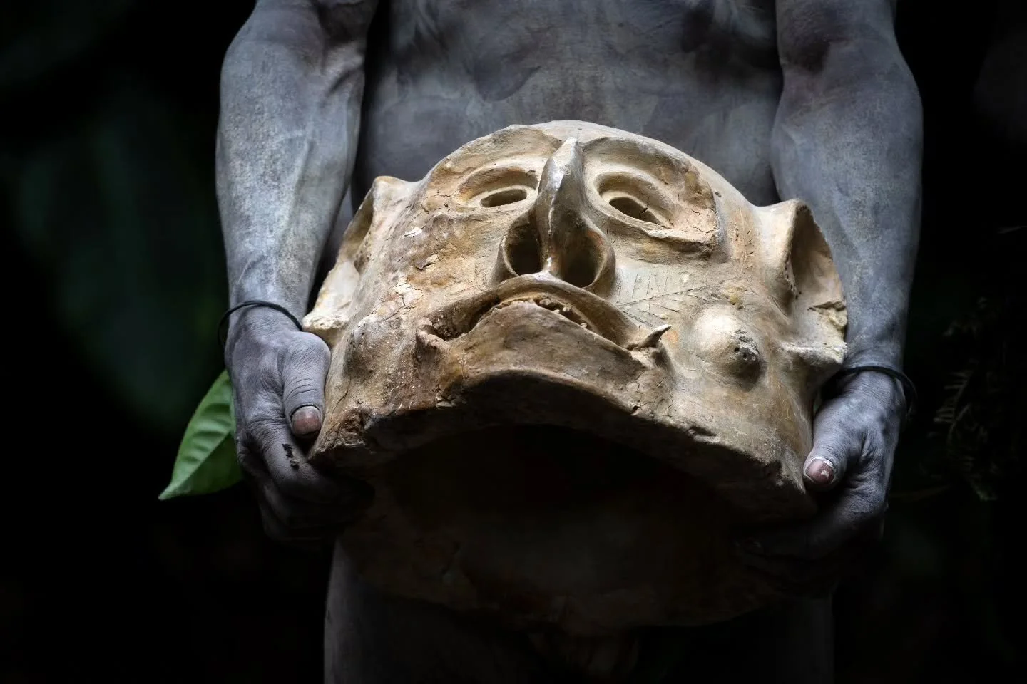 Asaro mudmen, Papua New Guinea.

Long ago, the Asaro tribes people hid along riverbanks covered in mud to escape an enemy attack. When they emerged, rival tribes mistook them for vengeful spirits and fled in terror, allowing the Asaro to reclaim thei