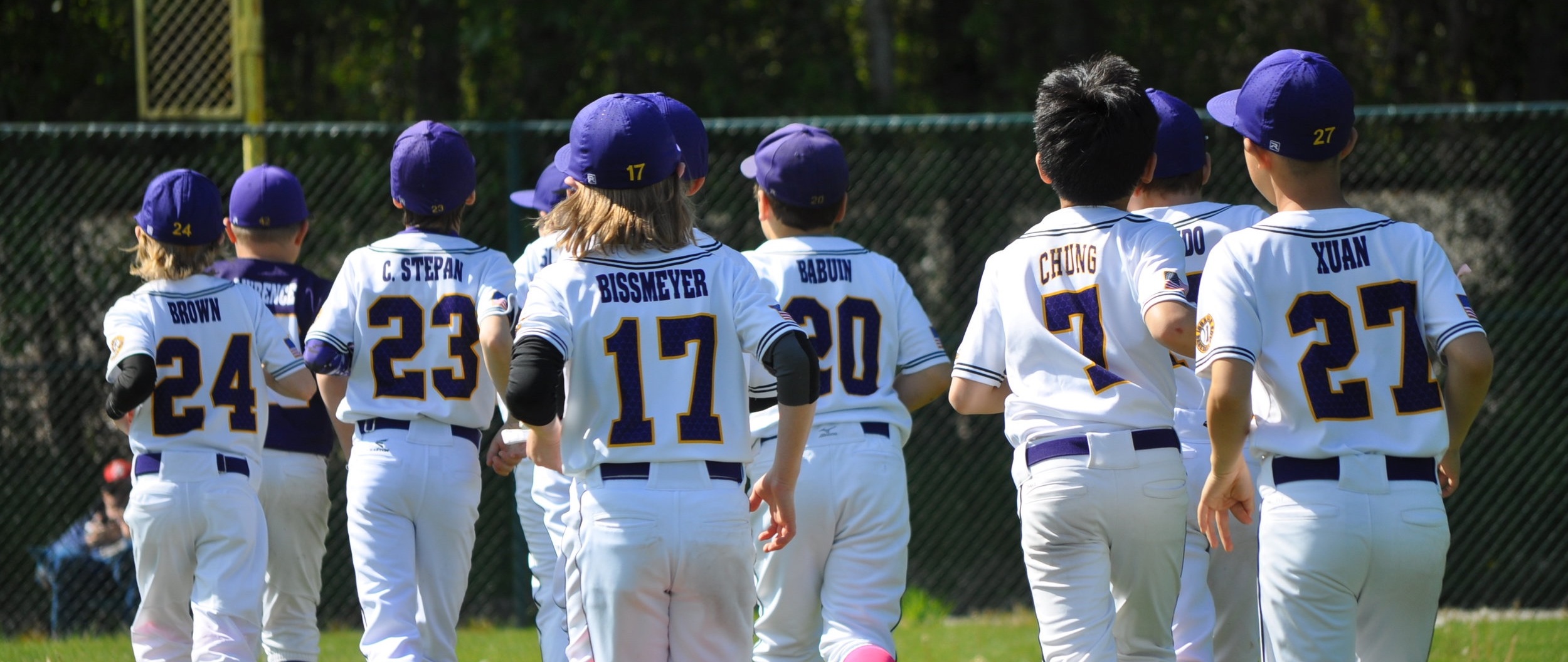 baseball team with purple uniforms