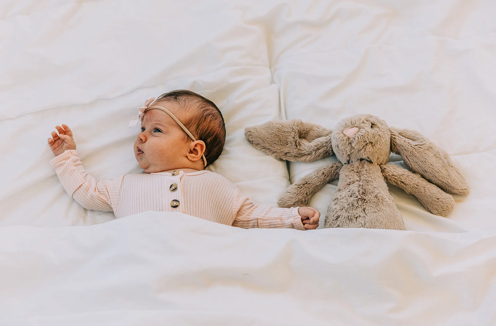 Darling newborn studio photo shoot for baby girl Leighton with her bunny in Logan, Utah by Bella Alder Photography in Blush Door Studio | #bellaalderphoto #newbornphotographer #utahnewbornphotos #babygirlnewborn #babygirl #blushdoorstudio #newbornsession #utahbabies #babyphotoshoot #newborns