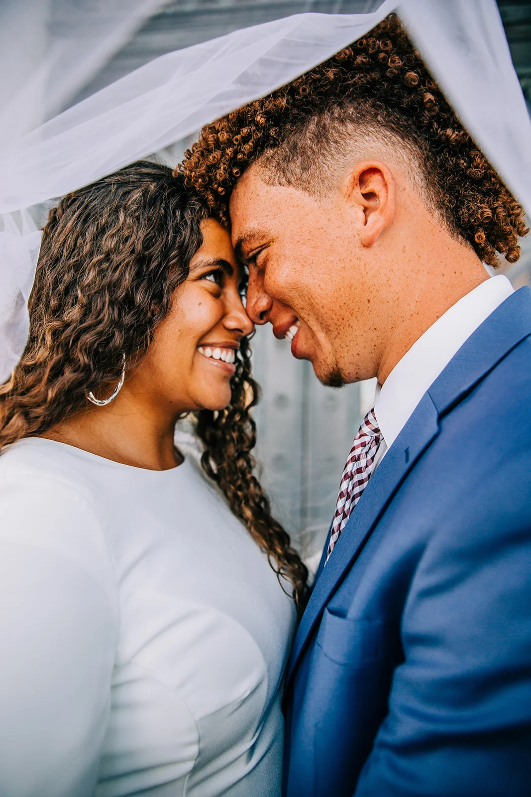  Bride and groom under the veil photographed by professional wedding photographer Bella Alder Photography in Salt Lake City, Utah at their formals session. #bellaalderphoto #formals #weddings #utahweddings #utahcouple #youngcouples #highschoolsweethe