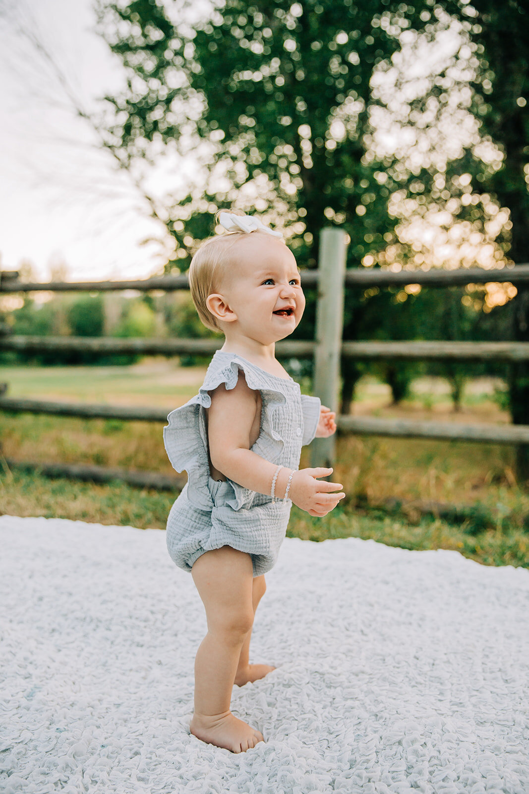  babies first birthday birthday girl babies on the move happy baby smiling pictures how to pose for kids kids fashion baby girl kids photography outfit inspo girl hair inspo baby hair bows props for babies girls rule cache valley photographer Denzil 