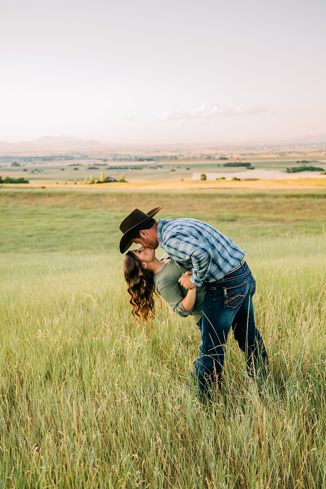  Utah engagement session couples photography kissing posing ideas dipping picture inspo holding hands long hair curly hair inspo woman hairstyles romantic posing inspo lovely couple intimate posing ideas summer engagements cache valley photographer #