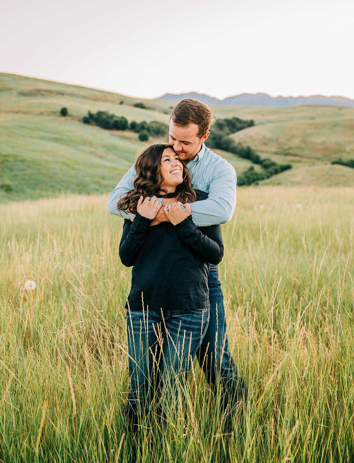  Utah couple summer time engagement session forehead kisses dreamy engagements loving couple embracing couple happy couple outfit inspo paradise Utah professional cache valley photographer future mr and mrs country couple semi formal outfit inspo rel