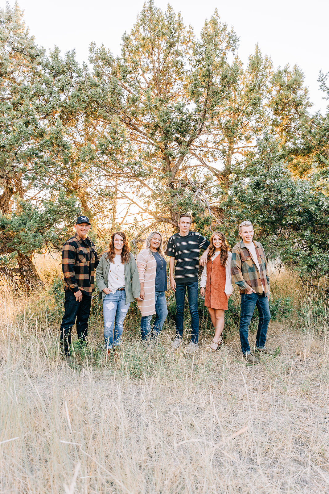  group shot at fashion shoot for the classic shop classic styles and easy-to-pair neutral pieces for men and women located in tremonton utah and online clothing boutique commercial photo shoot by bella alder photography commercial work fashion portra