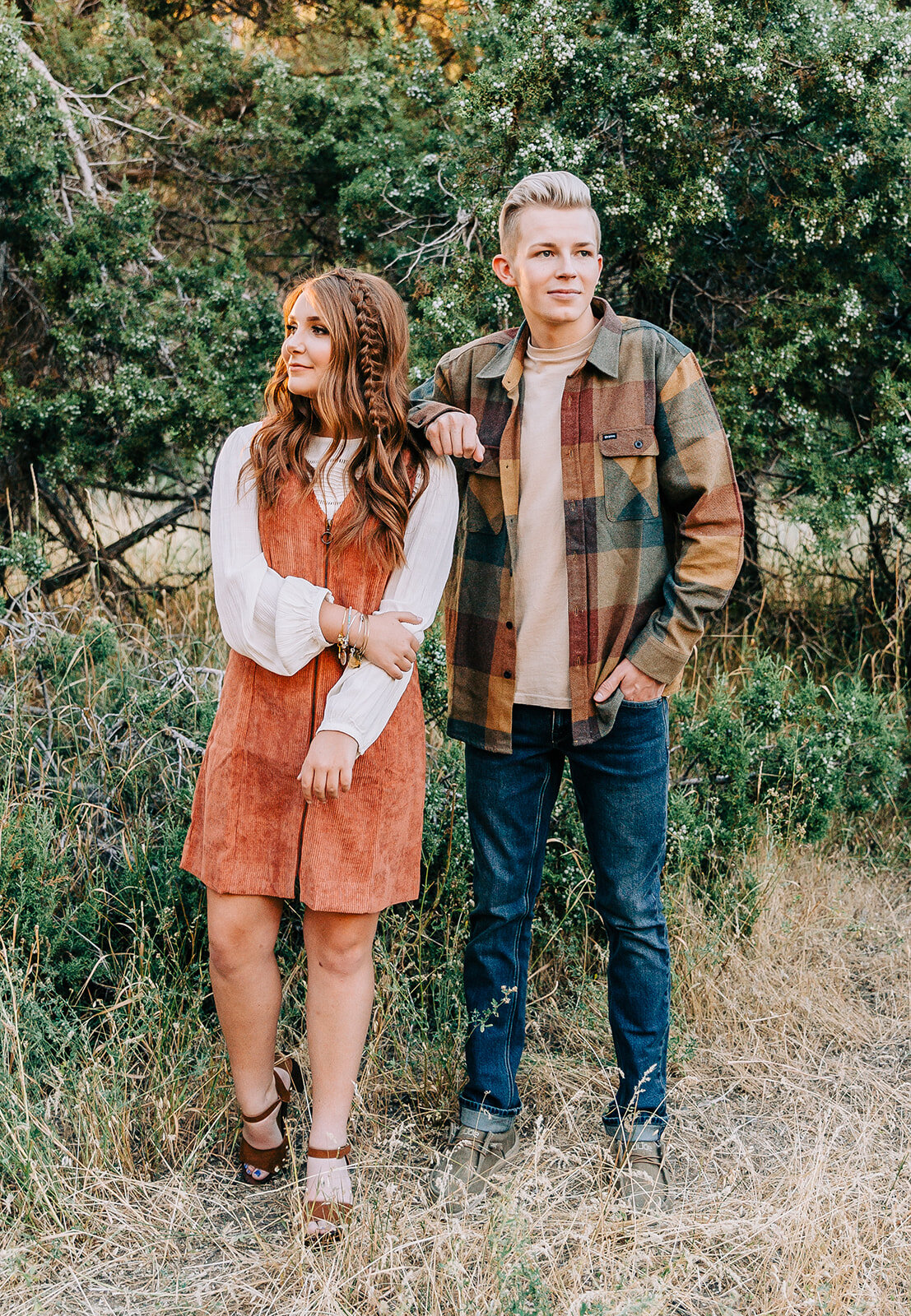  outfit inspiration for fall family photos commercial photography of new fashion pieces fall inventory online clothing boutique the classic shop in tremonton utah brown and gold colors fall fashion men’s plaid button-up with jeans white long sleeves 