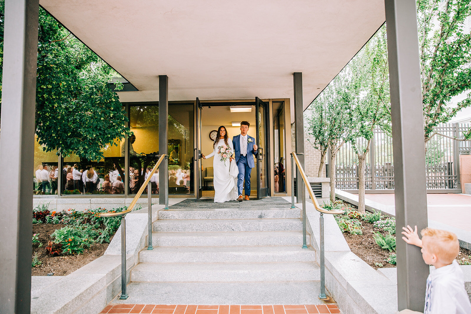  temple exit bride and groom blue suit wedding style inspiration lds temple exit after sealing ceremony salt lake city lds temple wedding utah couple temple square professional wedding photos affordable wedding photographer bella alder photography #b