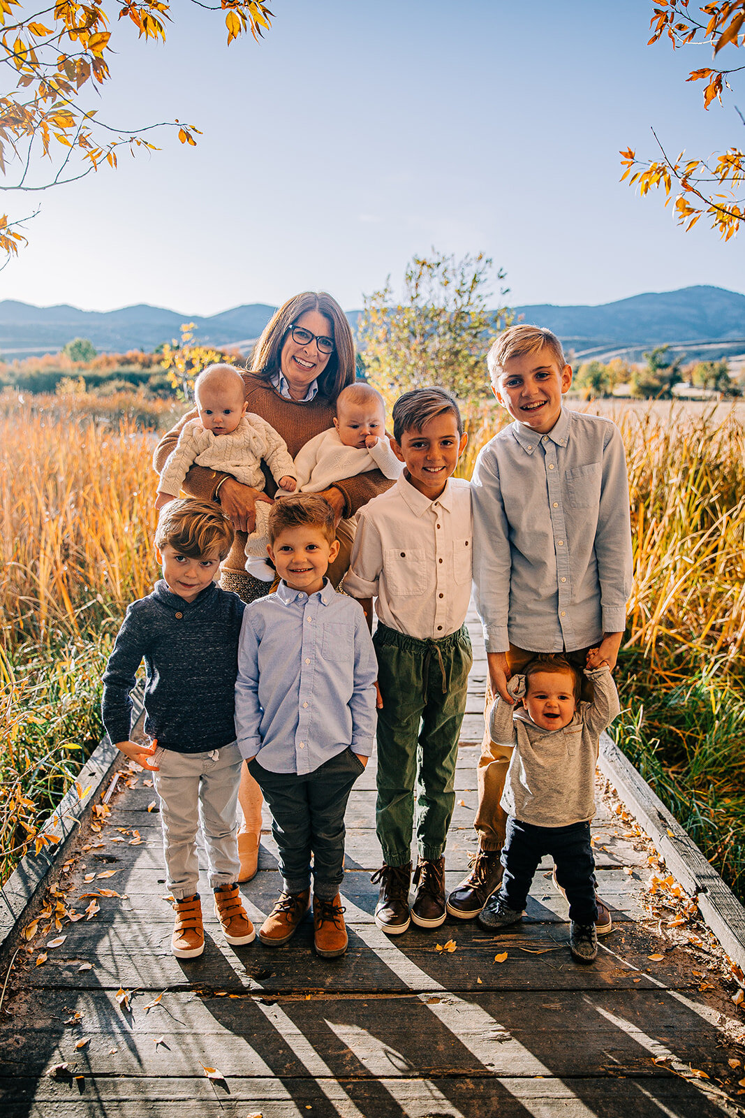 grandma with her grandsons grandkids boardwalk family pictures garden city park bear lake utah together again fields of gold mountains lakeside photos professional photographers in utah utah family photographers extended family siblings families are