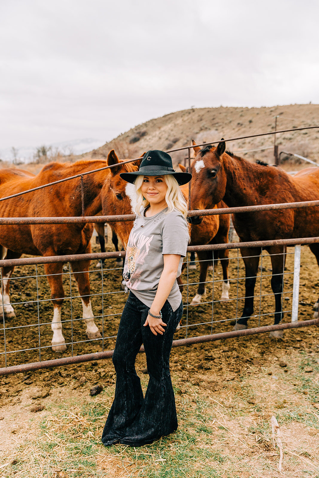  cowgirl hat tied shirt bell bottom pants hat styling accent jewelry long hairstyles hair and makeup inspiration country style professional photographers in utah commercial photographers in utah horses wild rag boutique commercial photography product