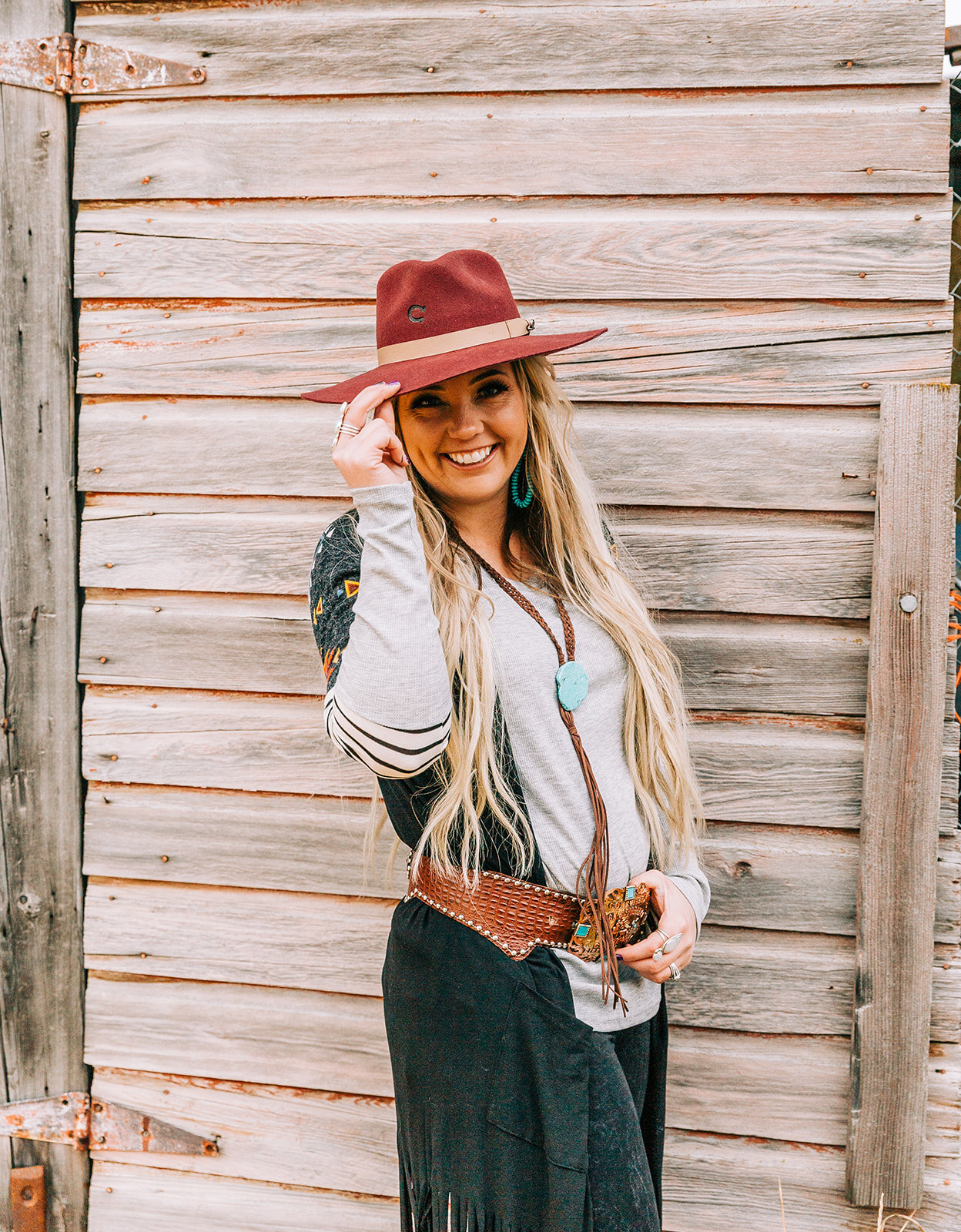  red hat accent jewelry cardigan leather belt leather jewelry long hairstyles hair and makeup inspiration country style professional photographers in utah commercial photographers in utah horses wild rag boutique commercial photography product photog