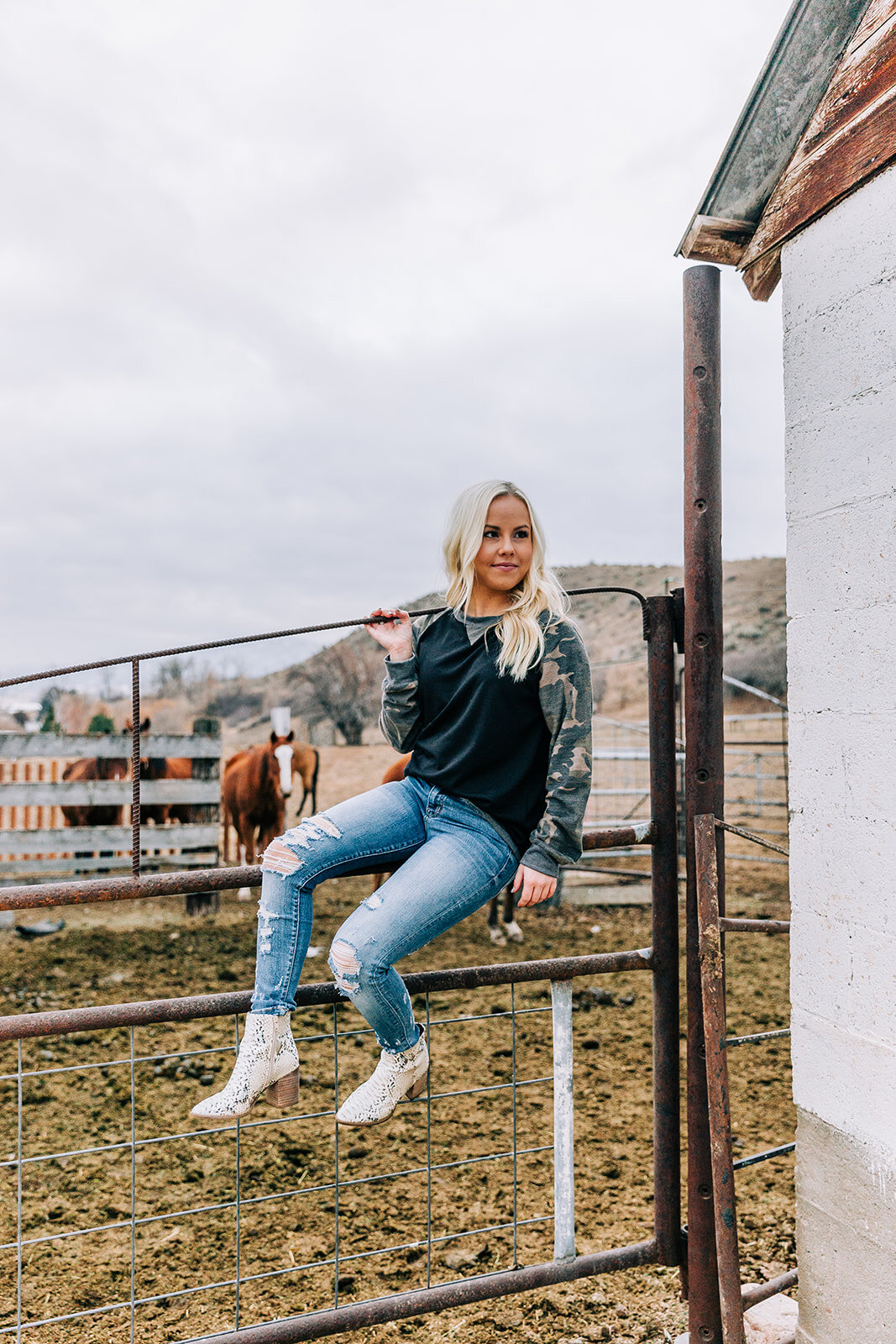  white snakeskin ankle boots distressed denim baseball tee camo print long hairstyles hair and makeup inspiration country style professional photographers in utah commercial photographers in utah horses wild rag boutique commercial photography produc