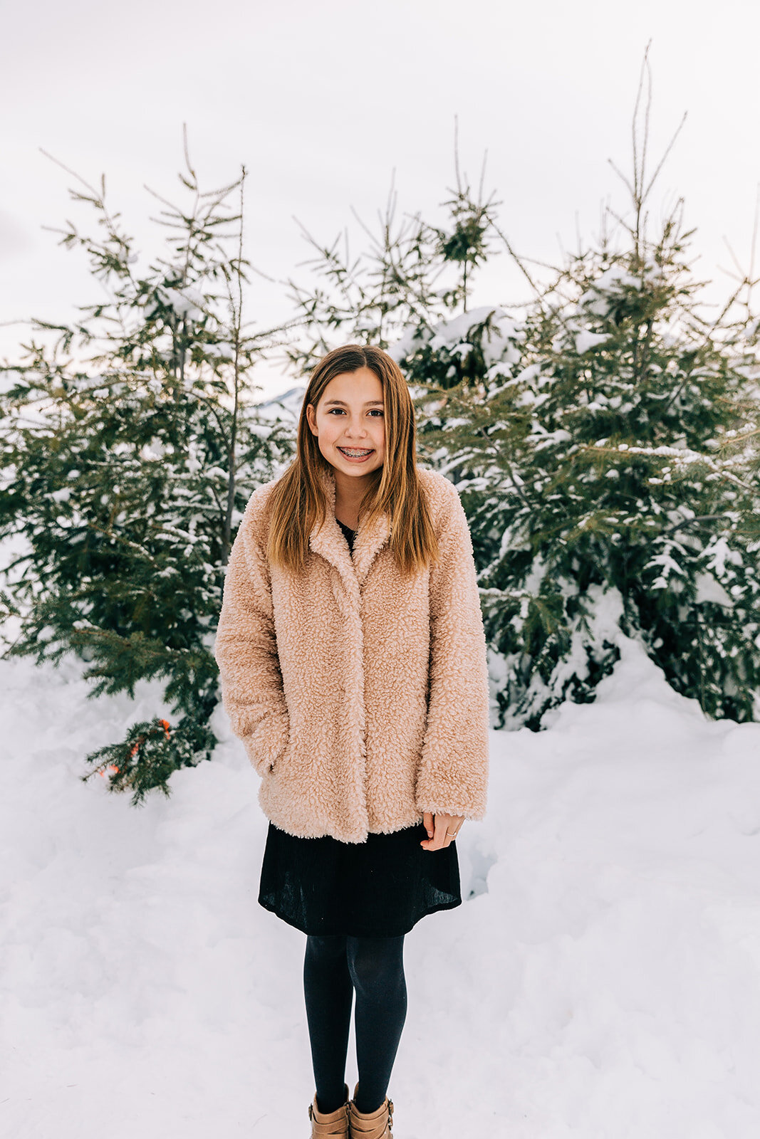  preteen fashion furry coat fuzzy coat braces winter fashion family pictures daughters family picture styling inspiration family pose ideas winter photoshoot snowy pictures adams acres tree farm family photographers in utah professional family photog