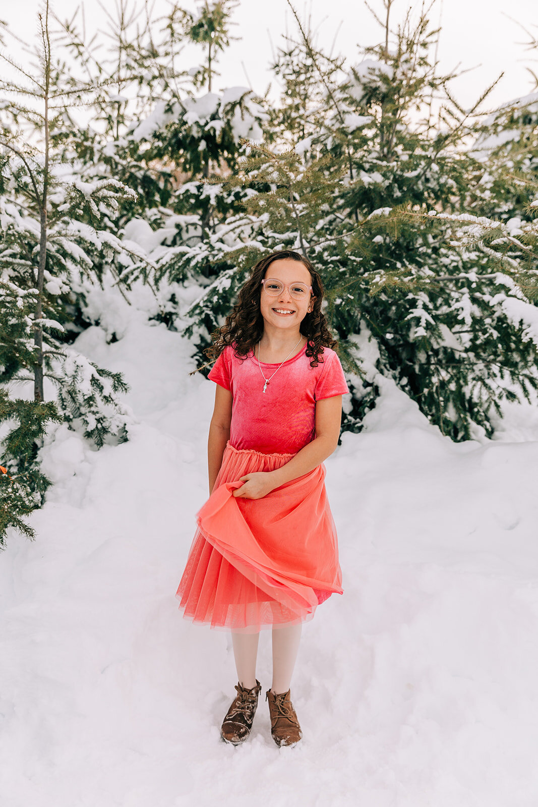  curly hairstyles hot pink tulle dress kids glasses winter fashion family pictures daughters family picture styling inspiration family pose ideas winter photoshoot snowy pictures adams acres tree farm family photographers in utah professional family 