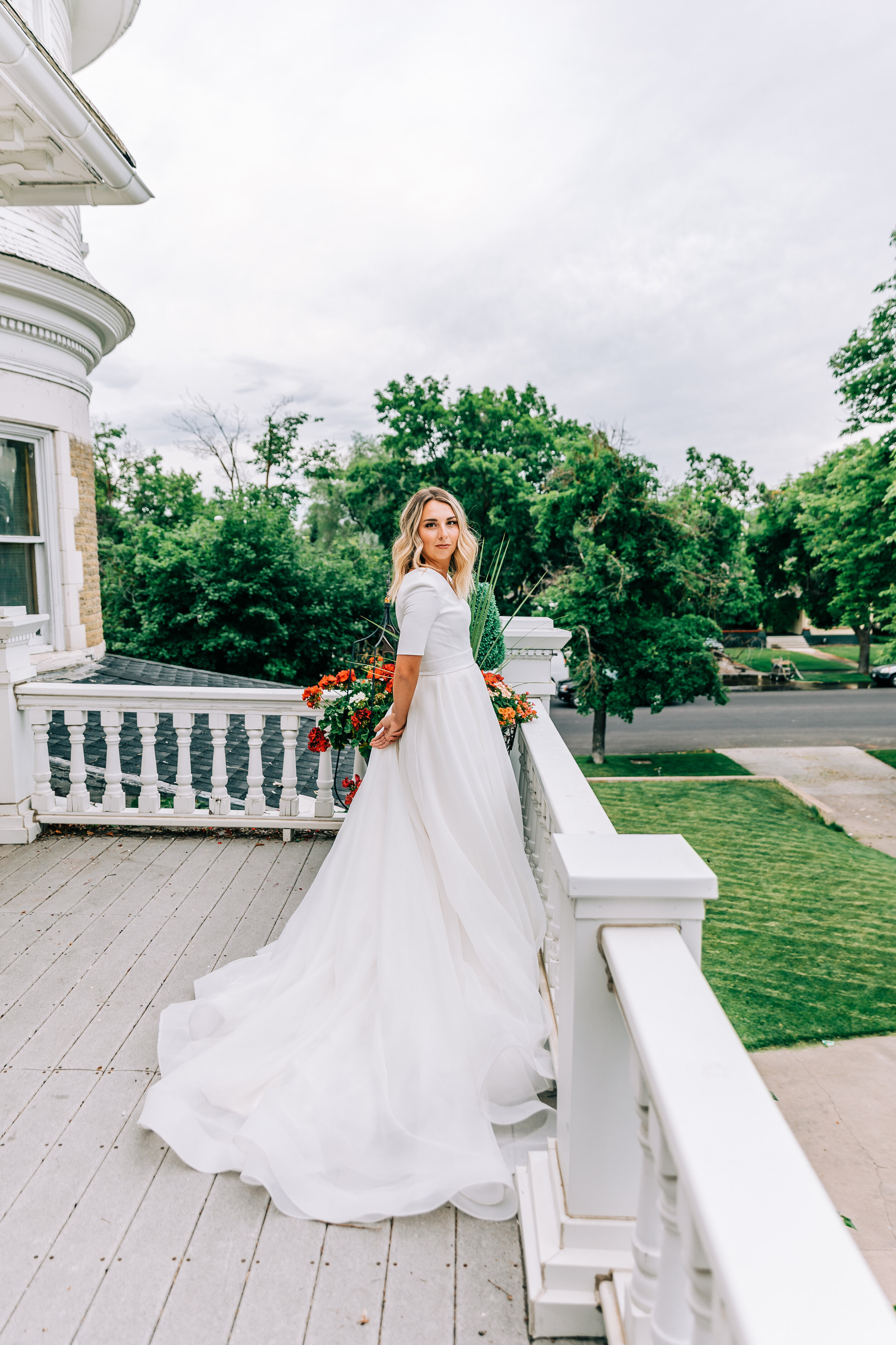  A soft and romantic bridal photo shoot on a Victorian styled porch in beautiful Logan, Utah by Bella Alder Photography. Gorgeous ball gown wedding dress provided by Elizabeth Cooper Design. Wedding inspiration ideas and goals Logan, Utah photography