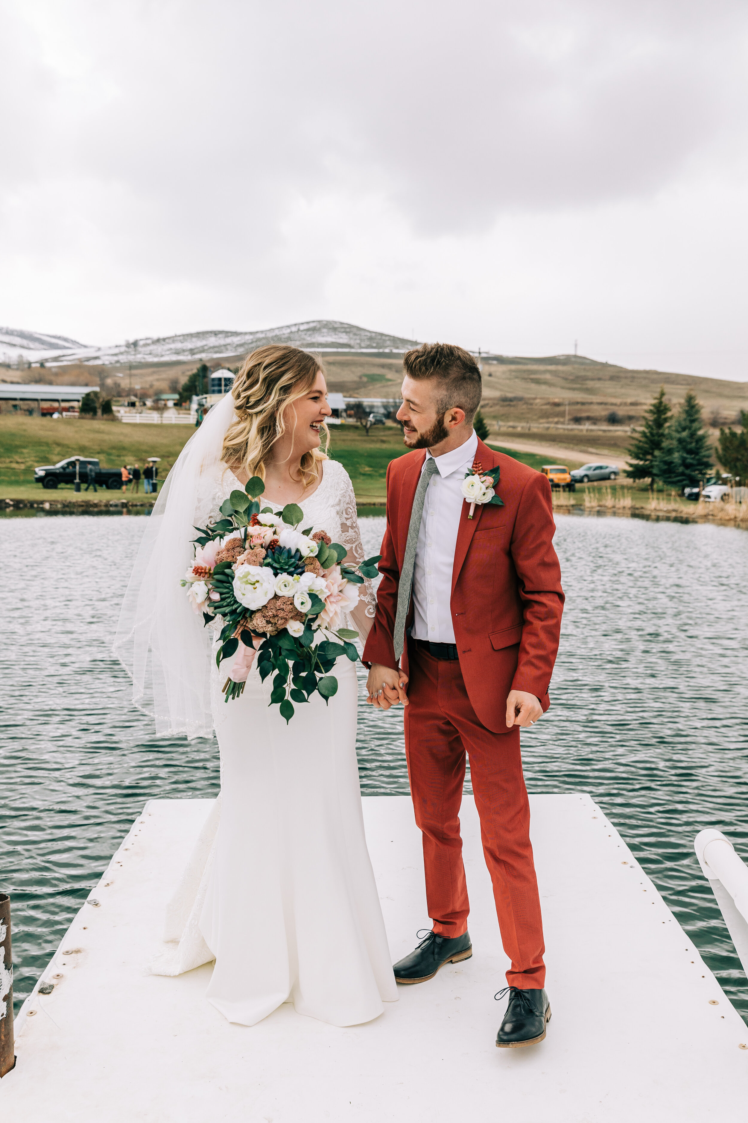  A grinning bride and groom look into each others eyes in a gorgeous elopement styled session in Preston, Idaho. Professional photographer Bella Alder Photography Idaho elopement session couple goals outdoor wedding inspiration simple rustic outdoor 