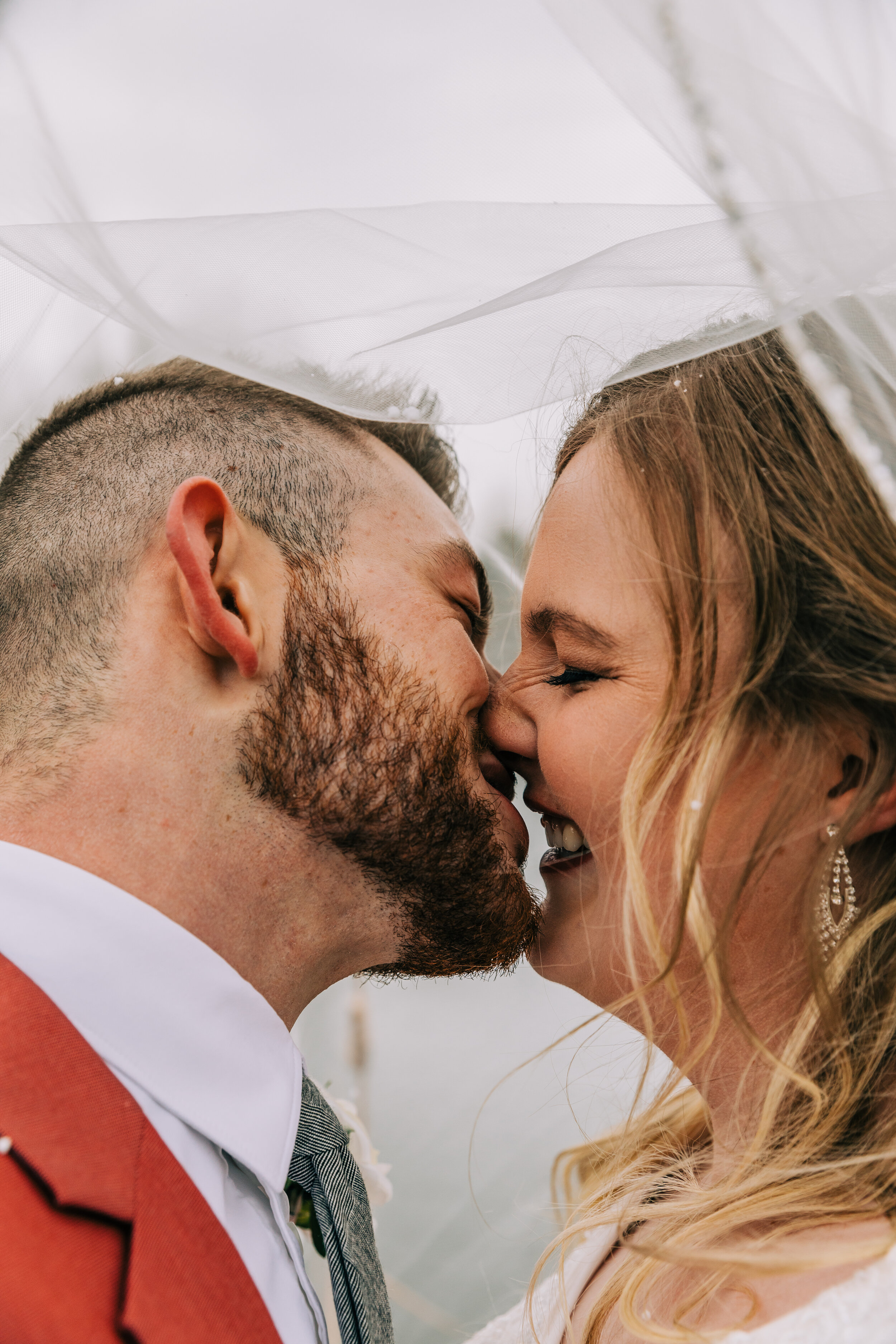  A kiss underneath the veil in a beautiful stormy elopement styled photo shoot by Bella Alder Photography. Elopement picture goals couple goals wedding goals life goals professional Utah photographer elopement photographer wedding photographer Presto