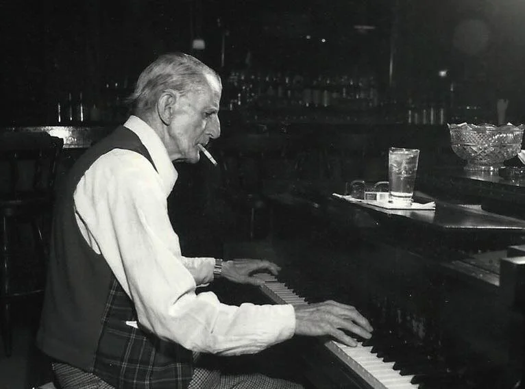 Jim Woolsey playing piano at the Walpack Inn
