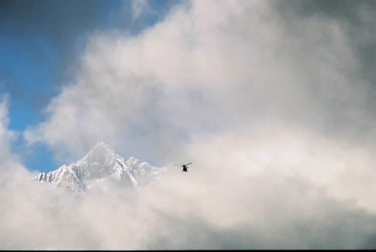 Annabel_Illingworth_Nepal_chopper_and_cloudy_mountain.jpg
