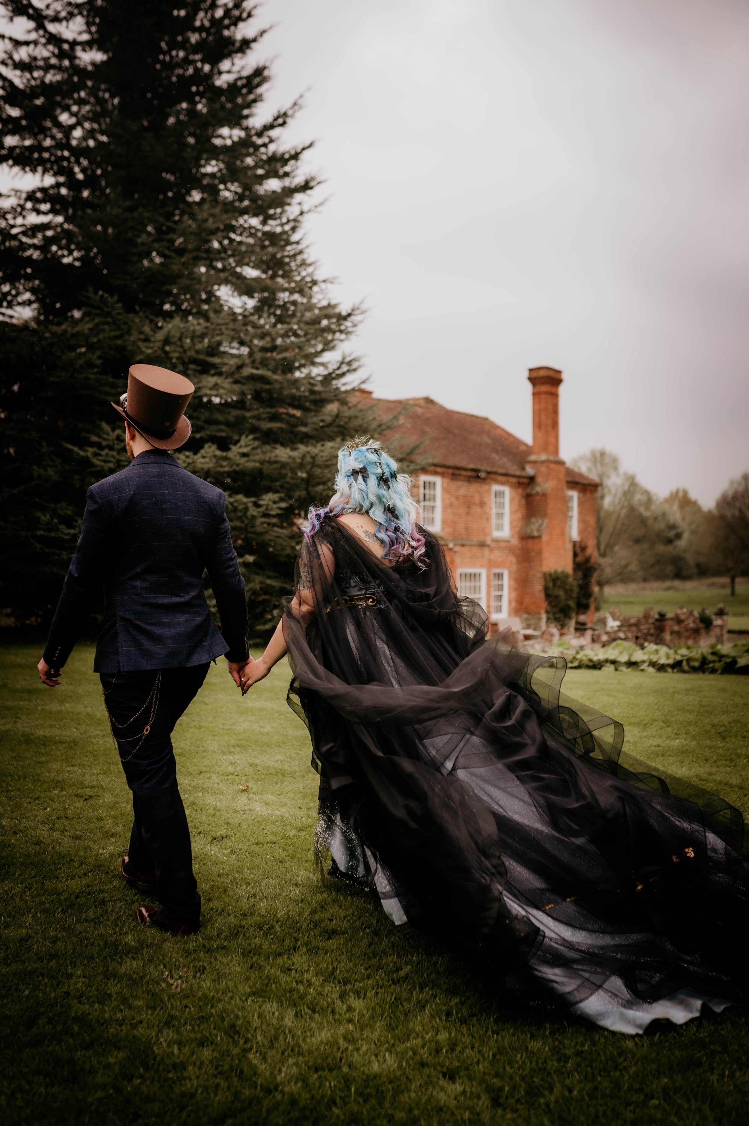 Legend Bridal Gothic Steampunk Wedding Just married walking.jpg