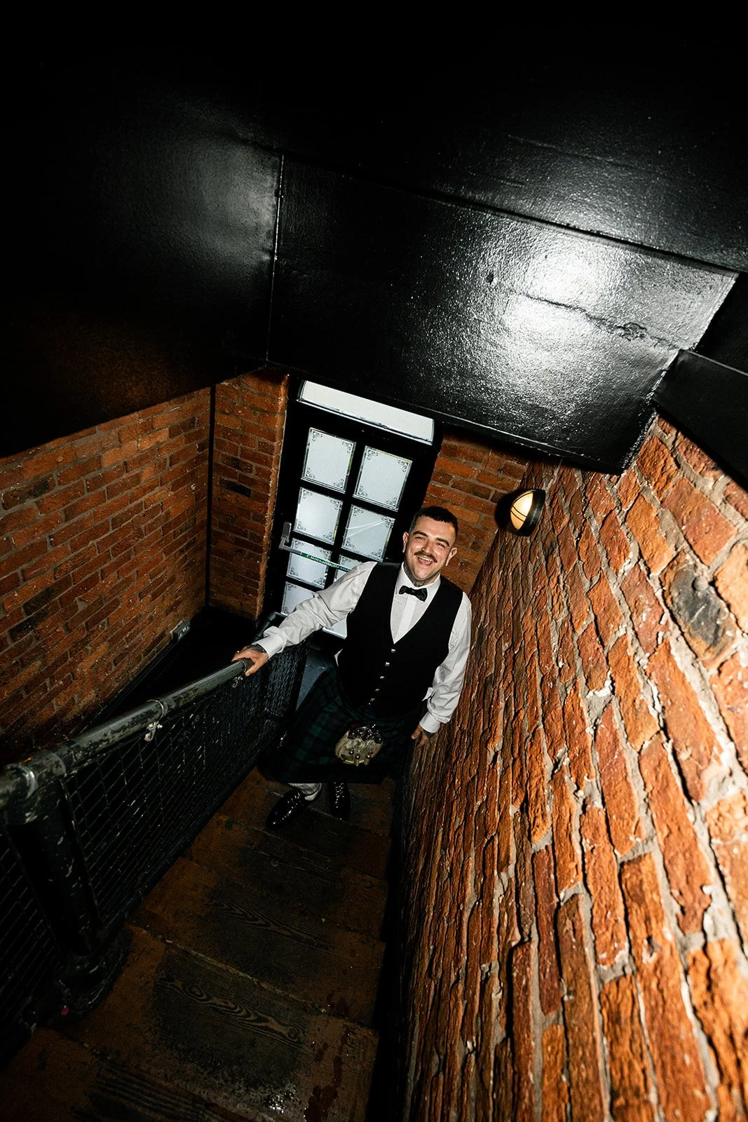 Legend Bridal - Alice and Connor - Groom stairwell.jpg