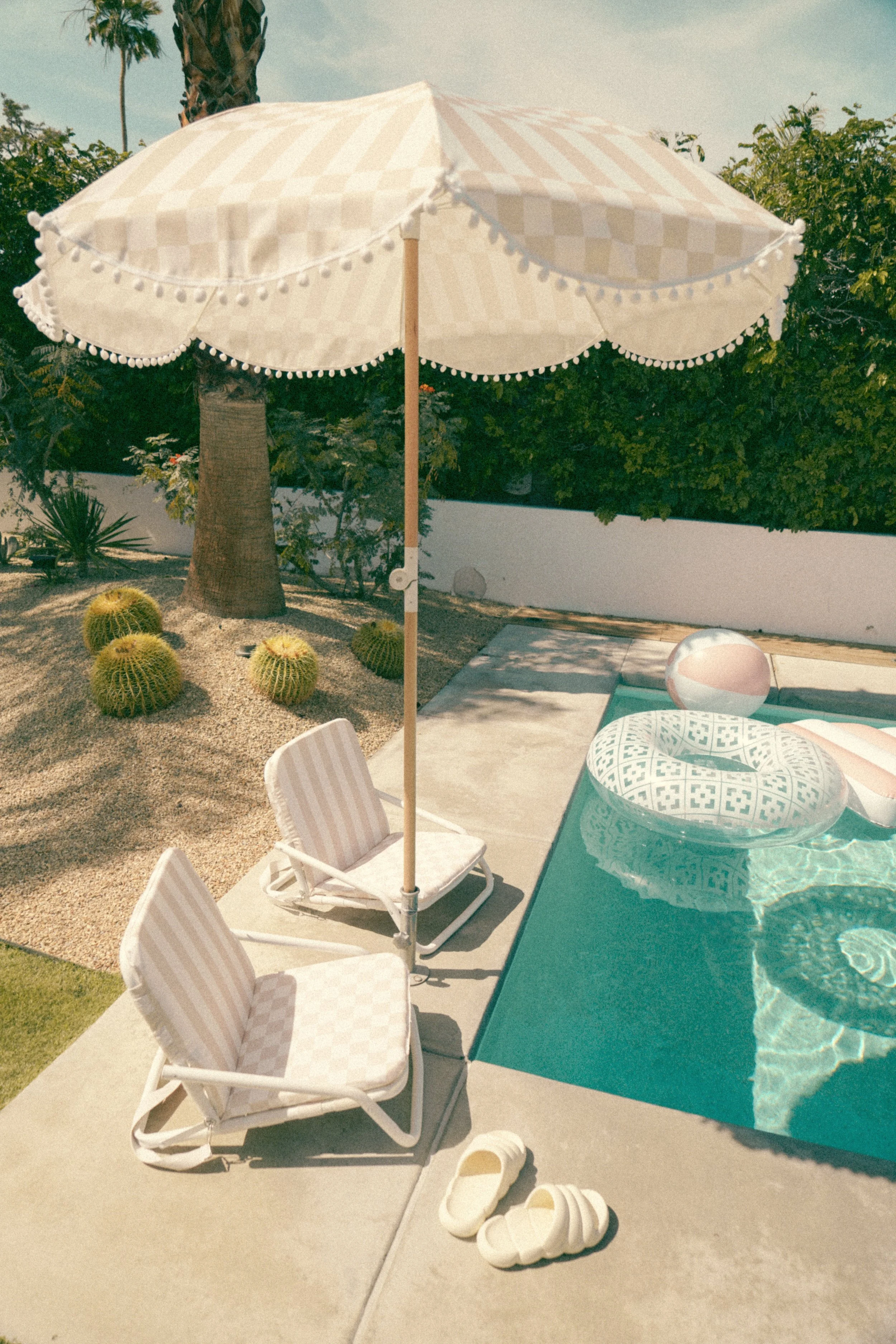 the CHECKER CABANA STRIPE Beach Chair — MINNIDIP LUXE INFLATABLE POOLS