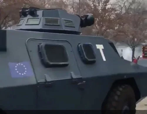 French law enforcement vehicles involved in riot control have EU flags